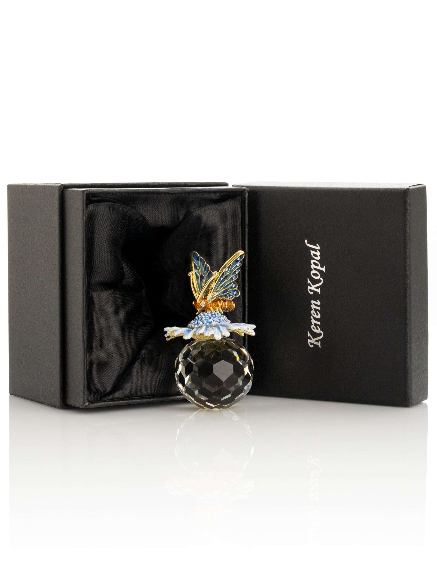 Keren Kopal Butterfly sitting on Flower and Crystal