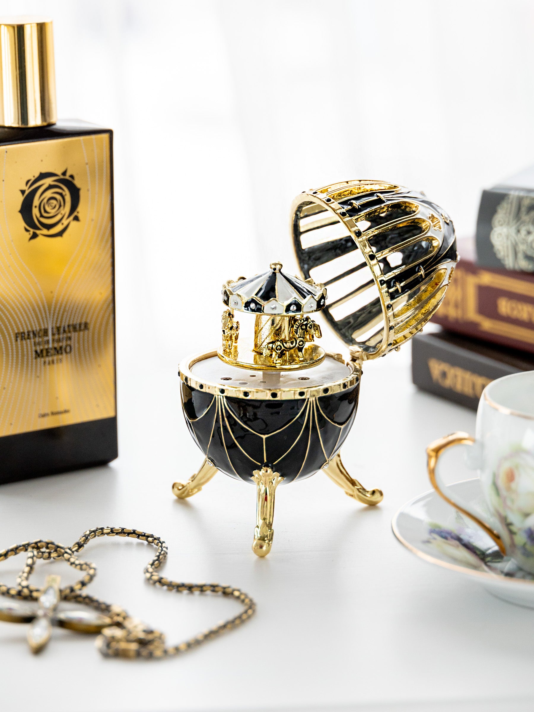 Keren Kopal Black and Gold Faberge Egg with Horse Carousel Surprise Inside