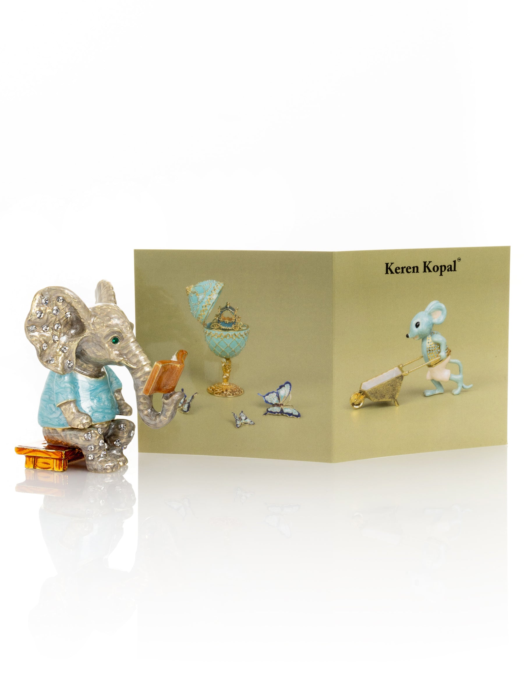 Keren Kopal Elephant Sitting and Reading a Book