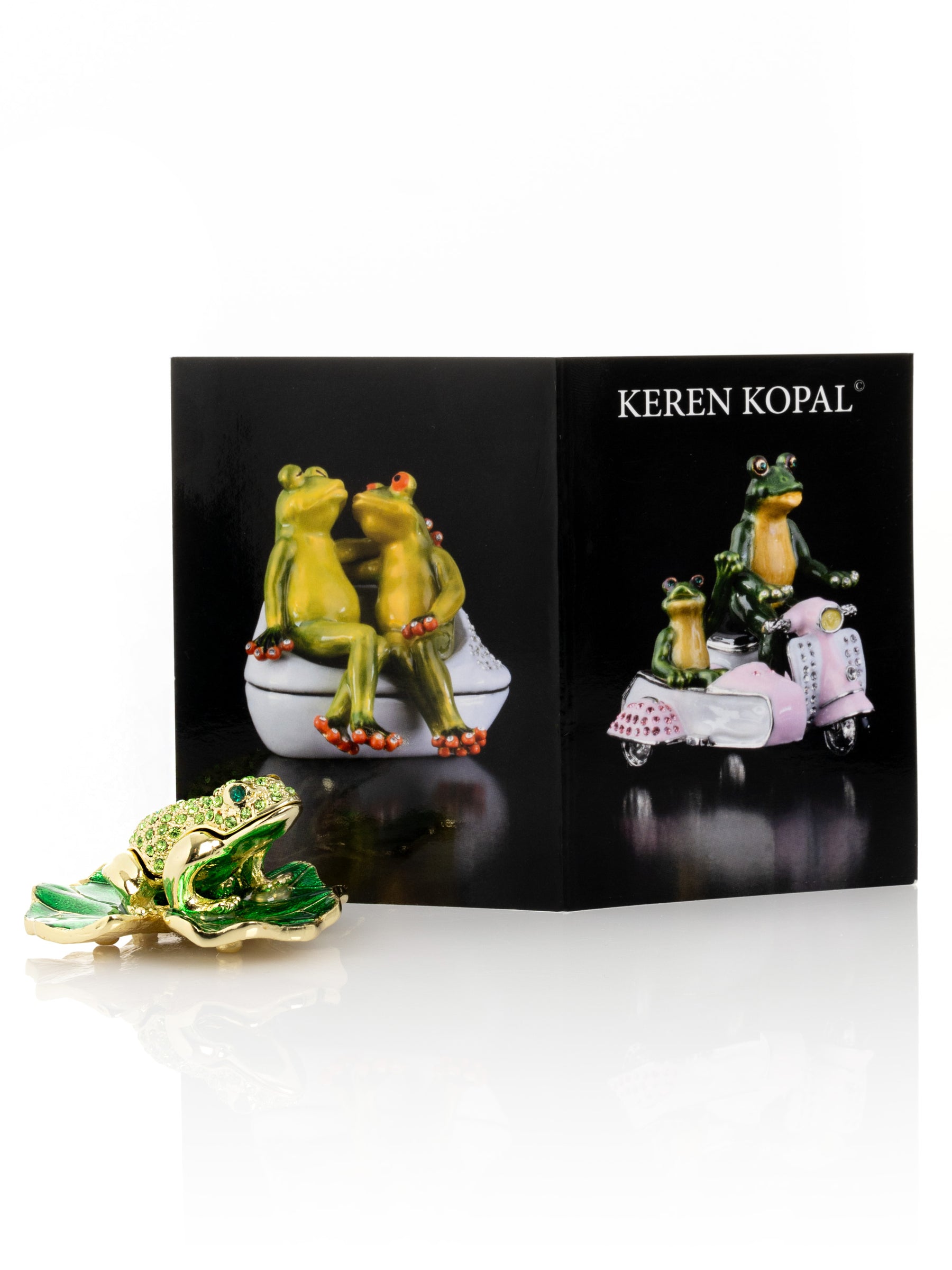 Keren Kopal Golden Frog on Green Leaf