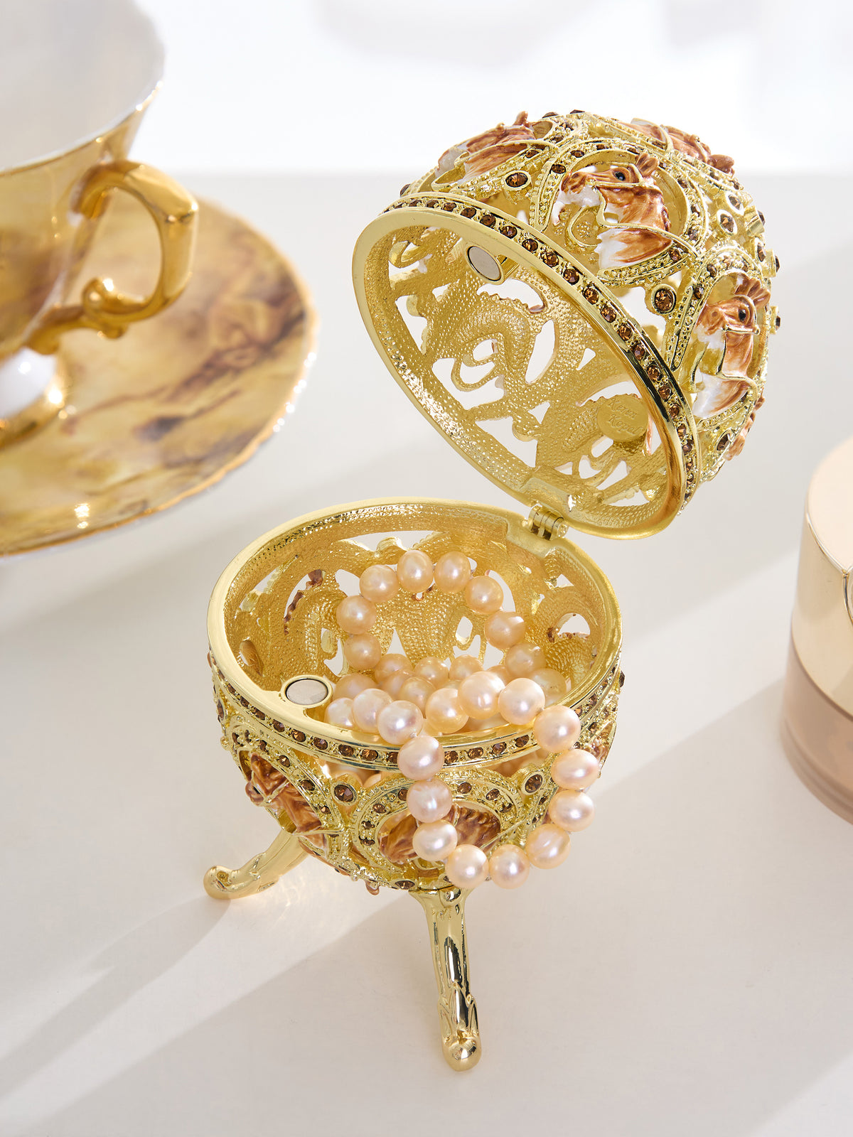 Keren Kopal Golden Easter Egg decorated with Horses