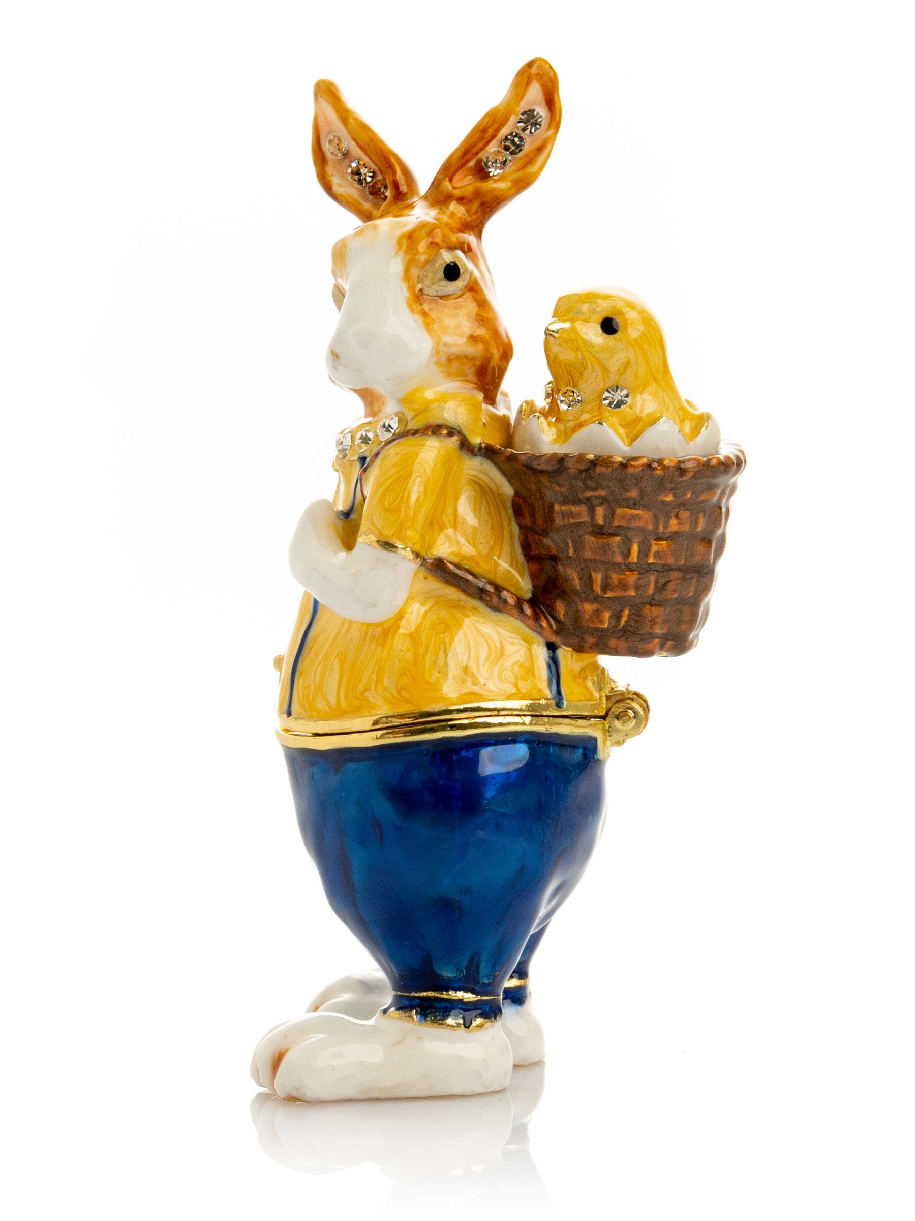 Keren Kopal Easter bunny carrying a baby chick on a basket