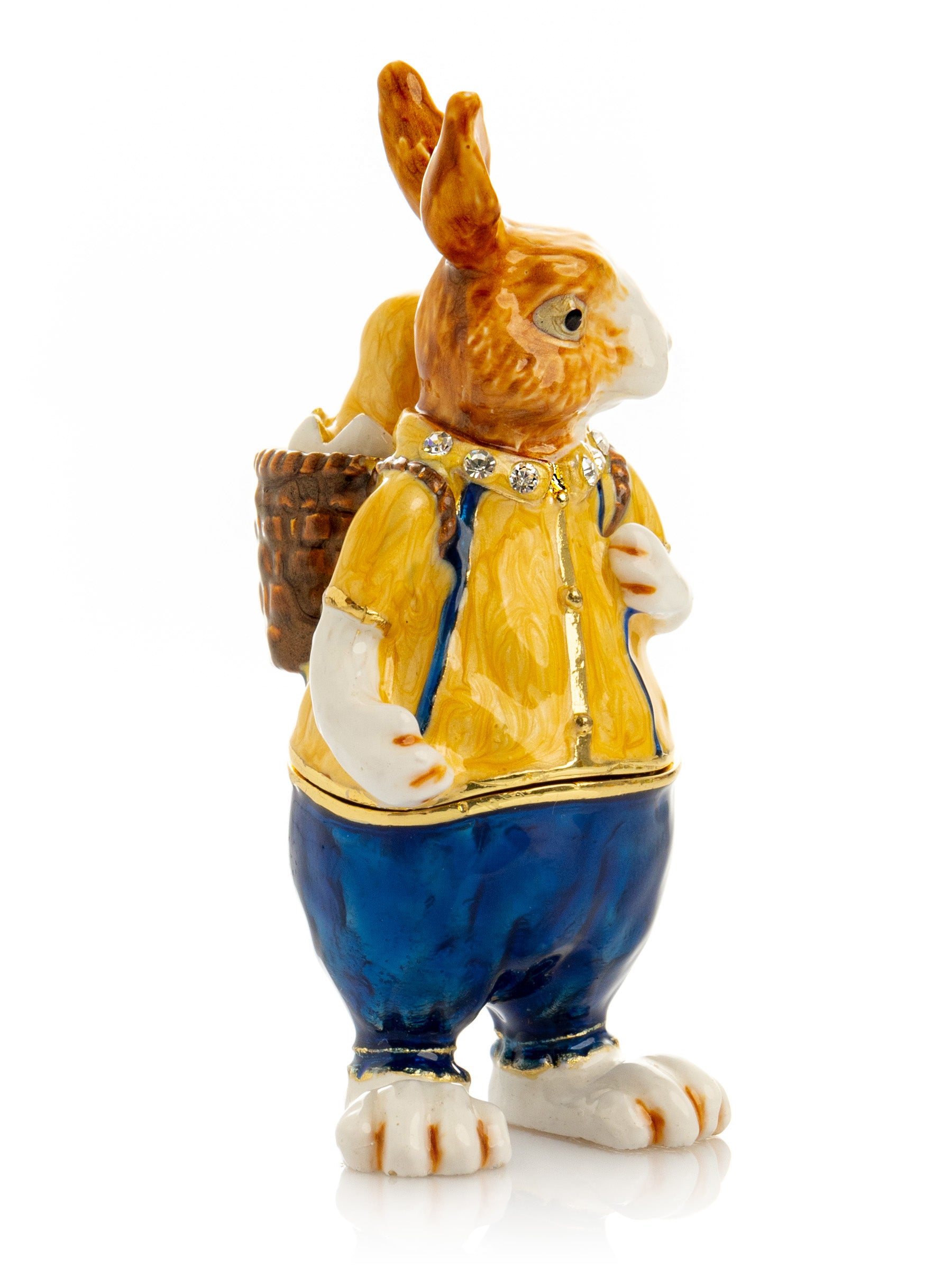 Keren Kopal Easter bunny carrying a baby chick on a basket