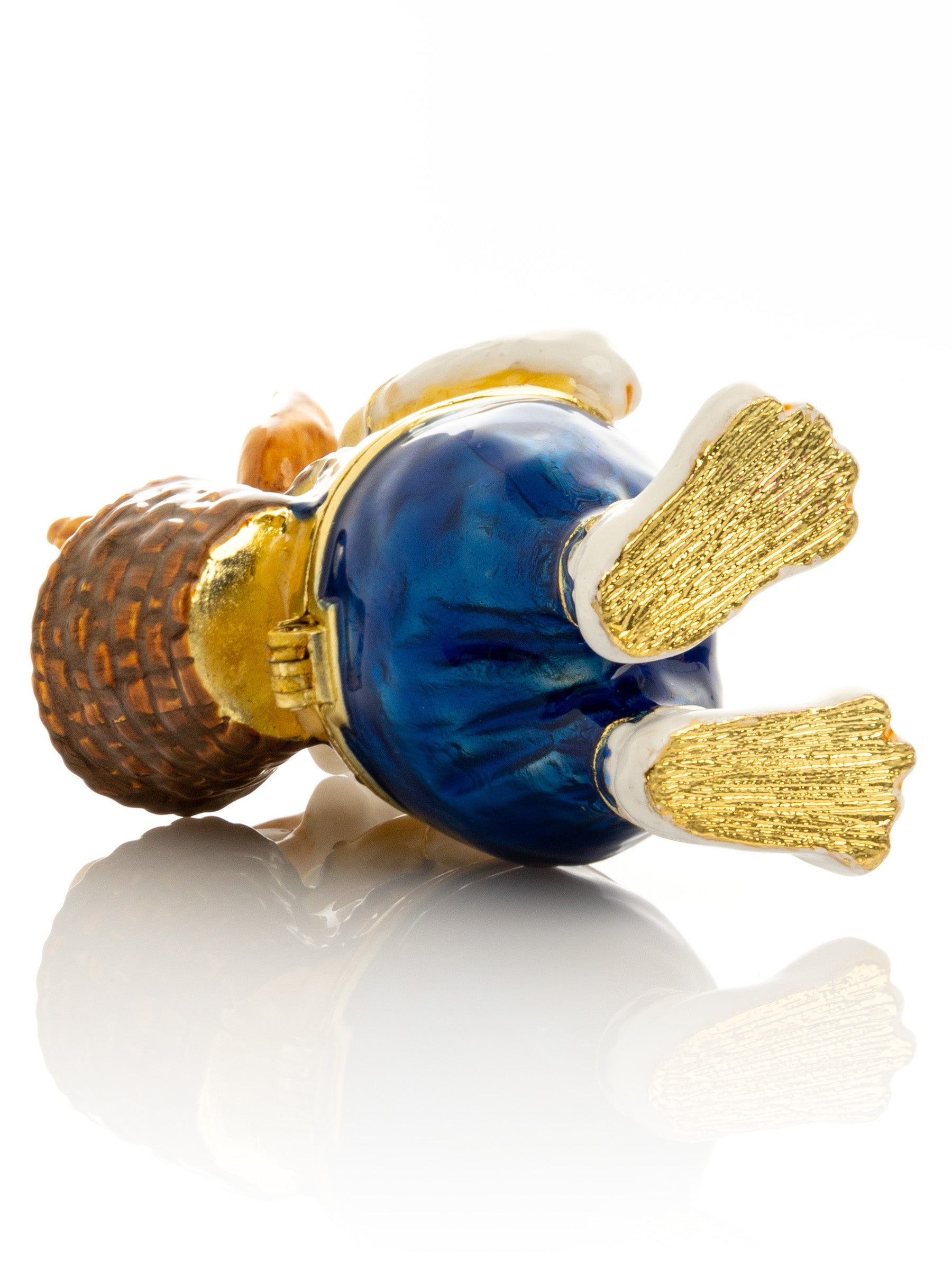 Keren Kopal Easter bunny carrying a baby chick on a basket