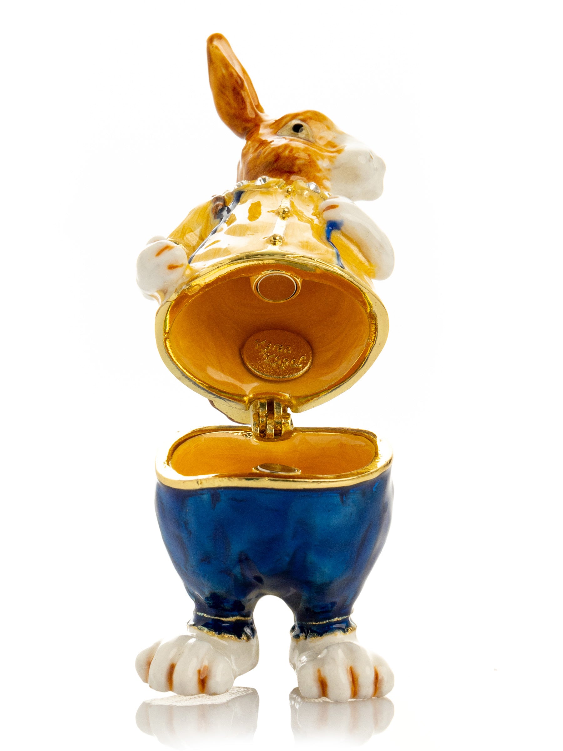 Keren Kopal Easter bunny carrying a baby chick on a basket