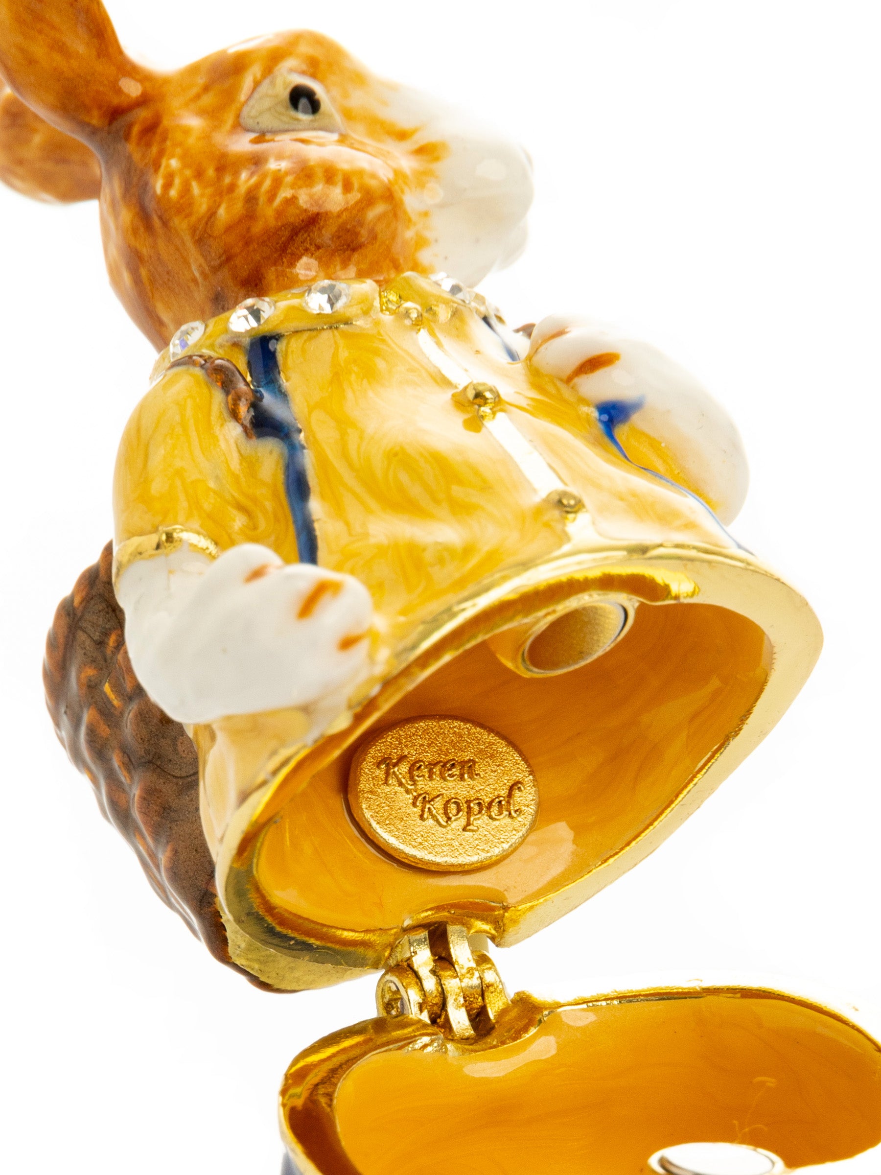 Keren Kopal Easter bunny carrying a baby chick on a basket