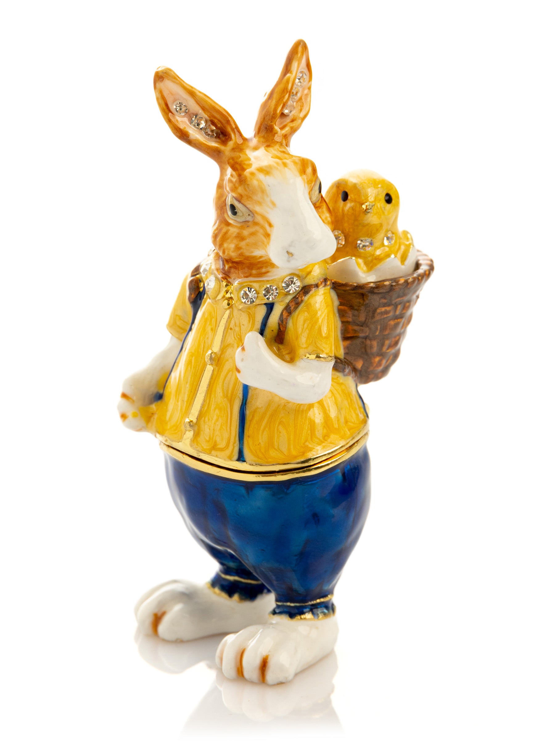 Keren Kopal Easter bunny carrying a baby chick on a basket