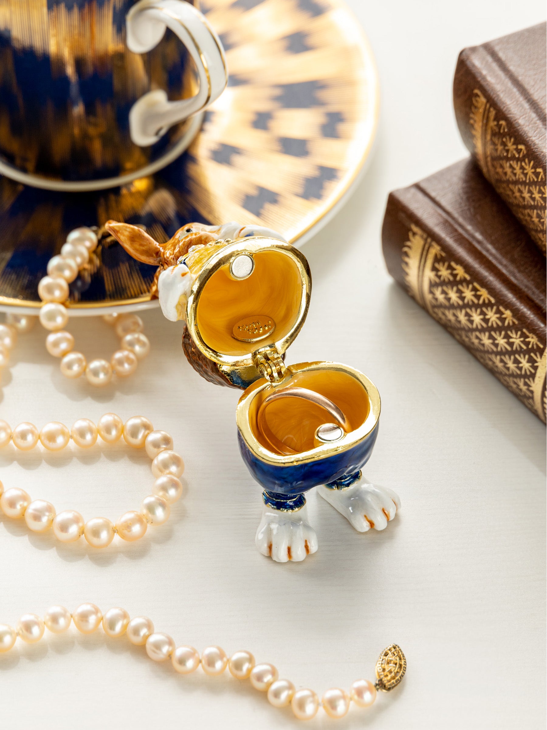 Keren Kopal Easter bunny carrying a baby chick on a basket