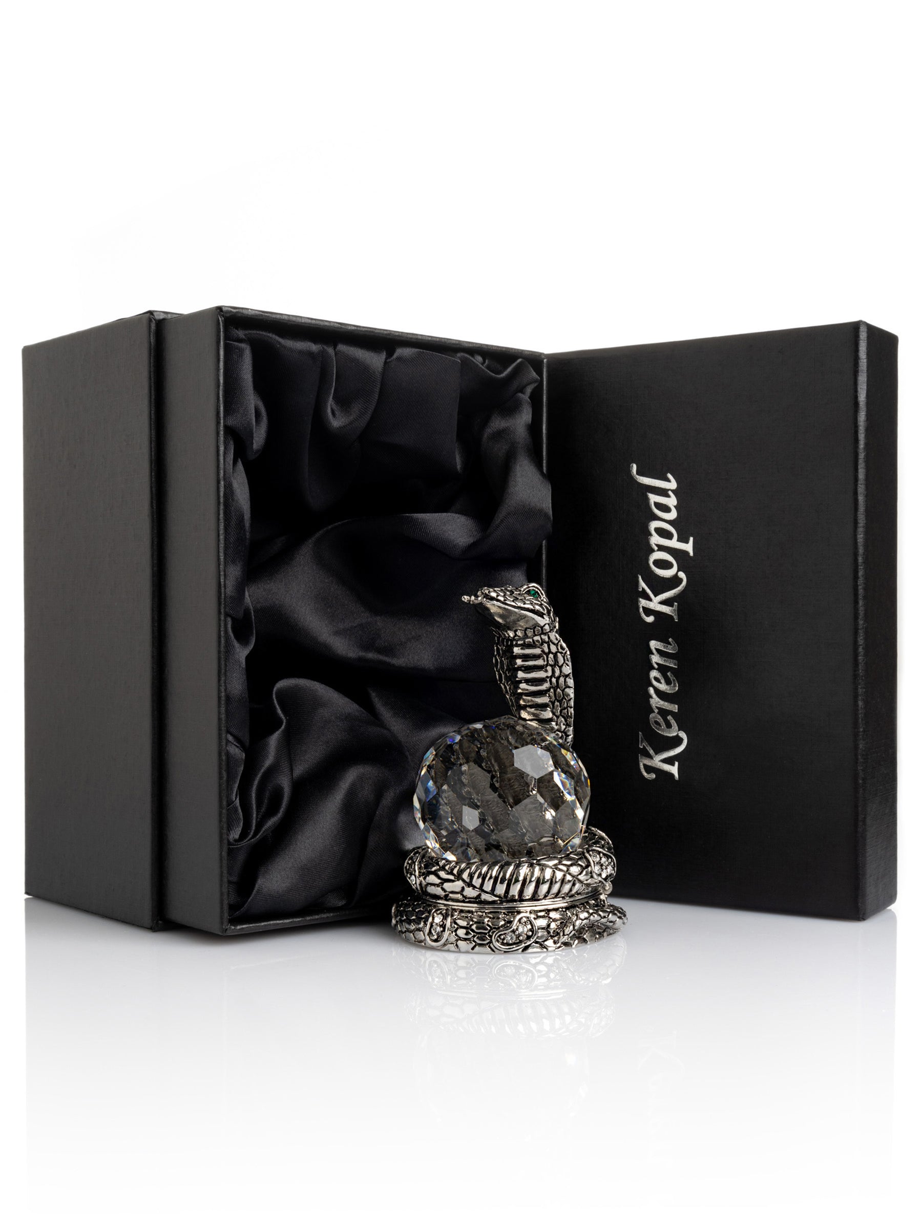 Keren Kopal Snake Holding Crystal