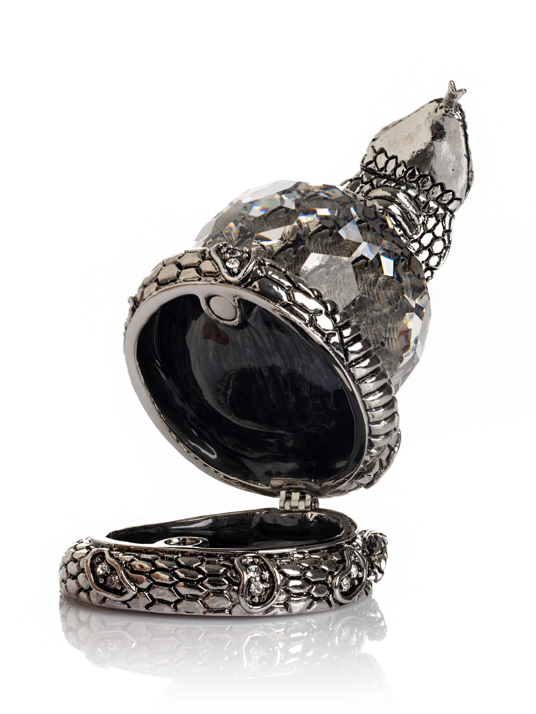 Keren Kopal Snake Holding Crystal