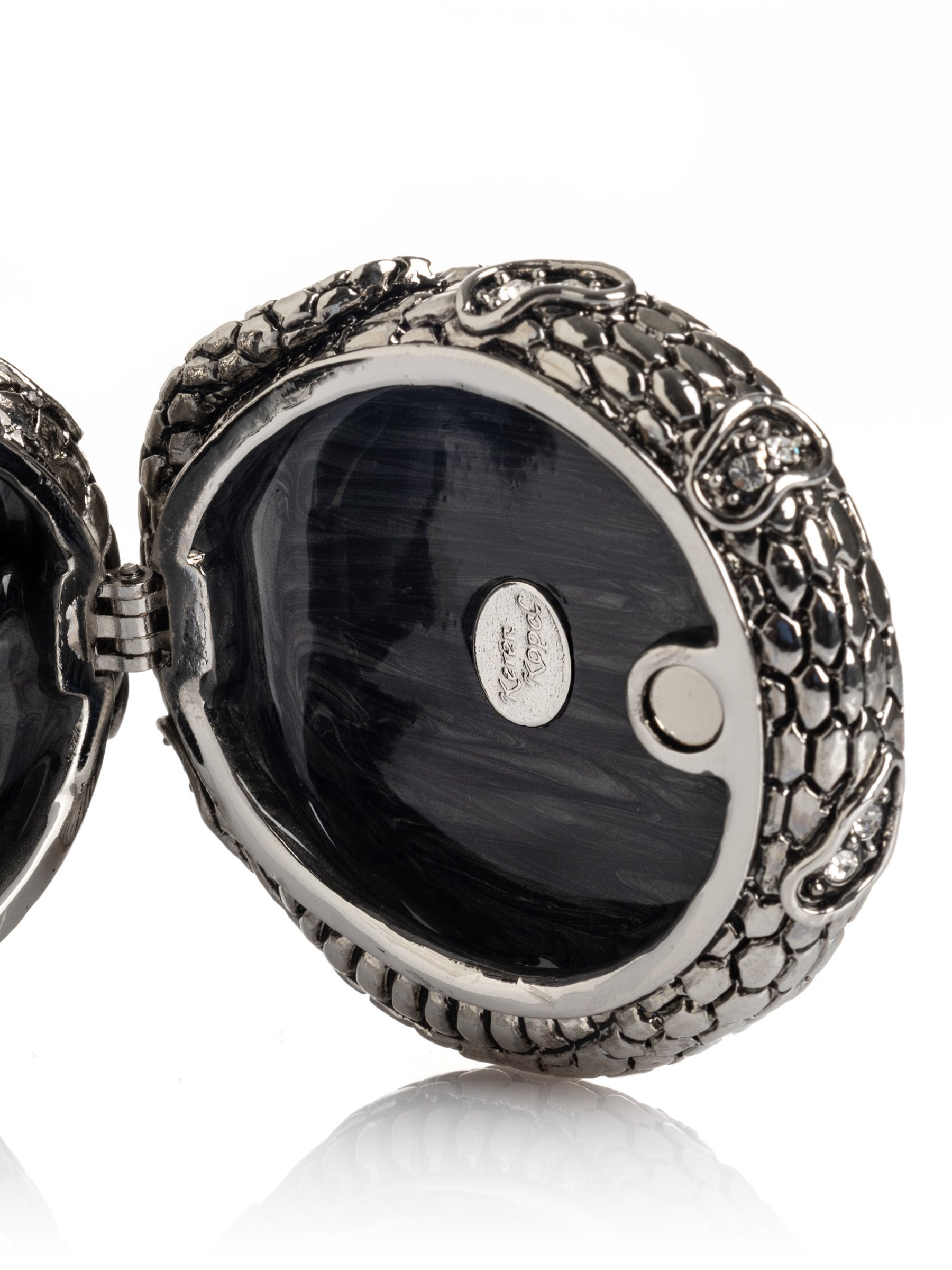 Keren Kopal Snake Holding Crystal