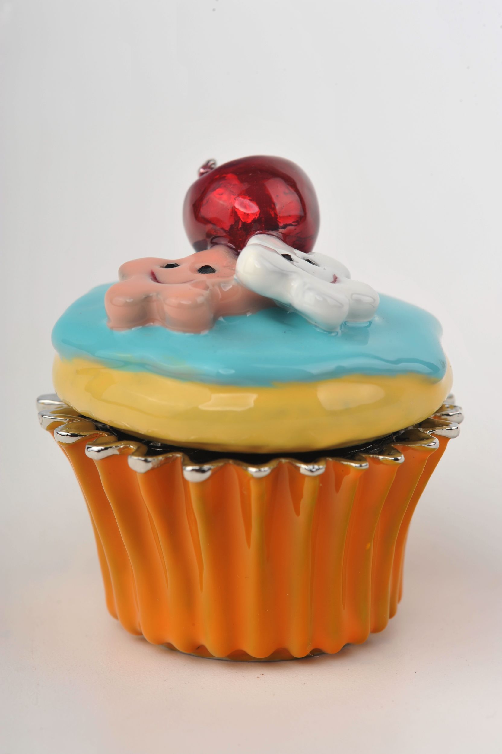 Keren Kopal Blue and Yellow Frosting Cupcake