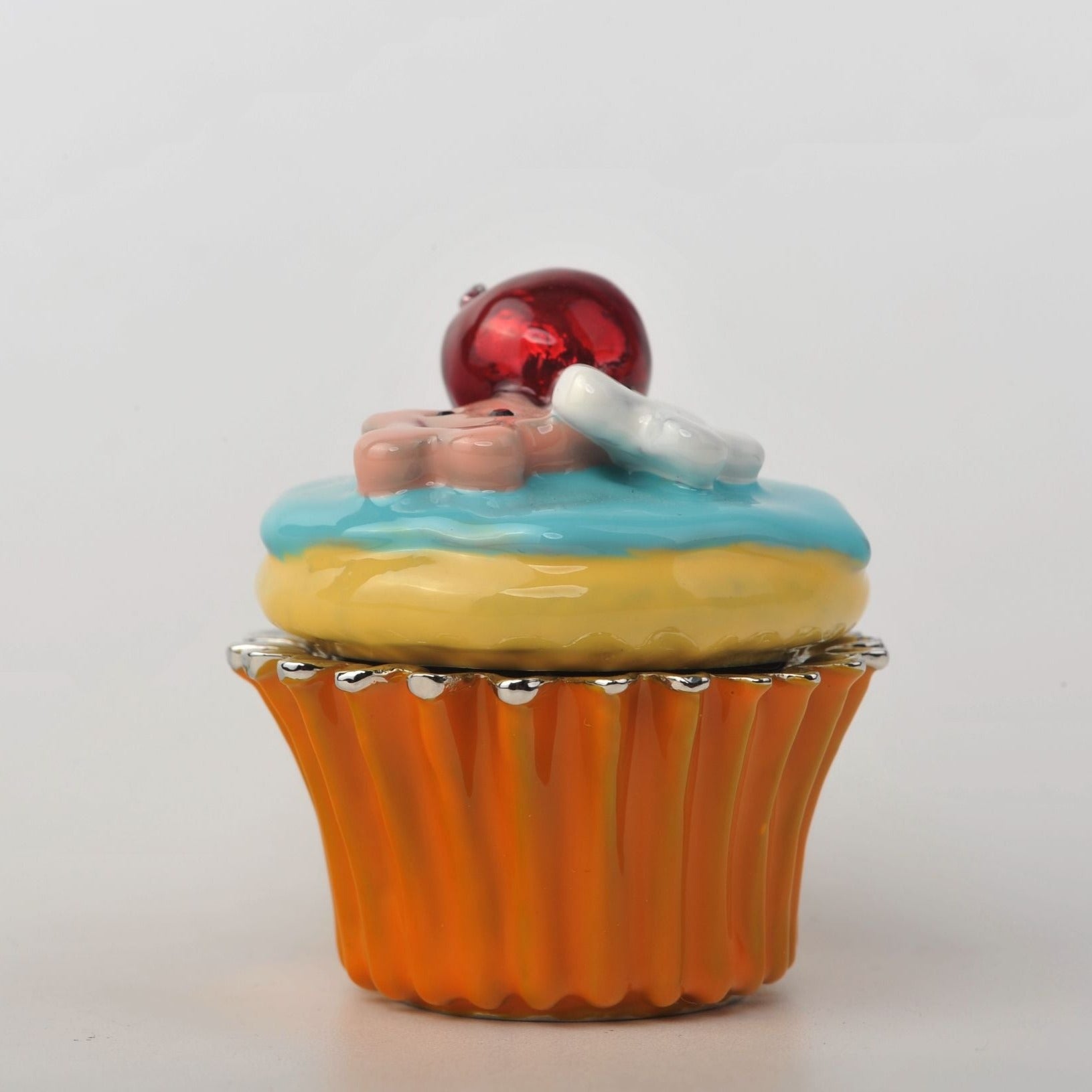 Keren Kopal Blue and Yellow Frosting Cupcake