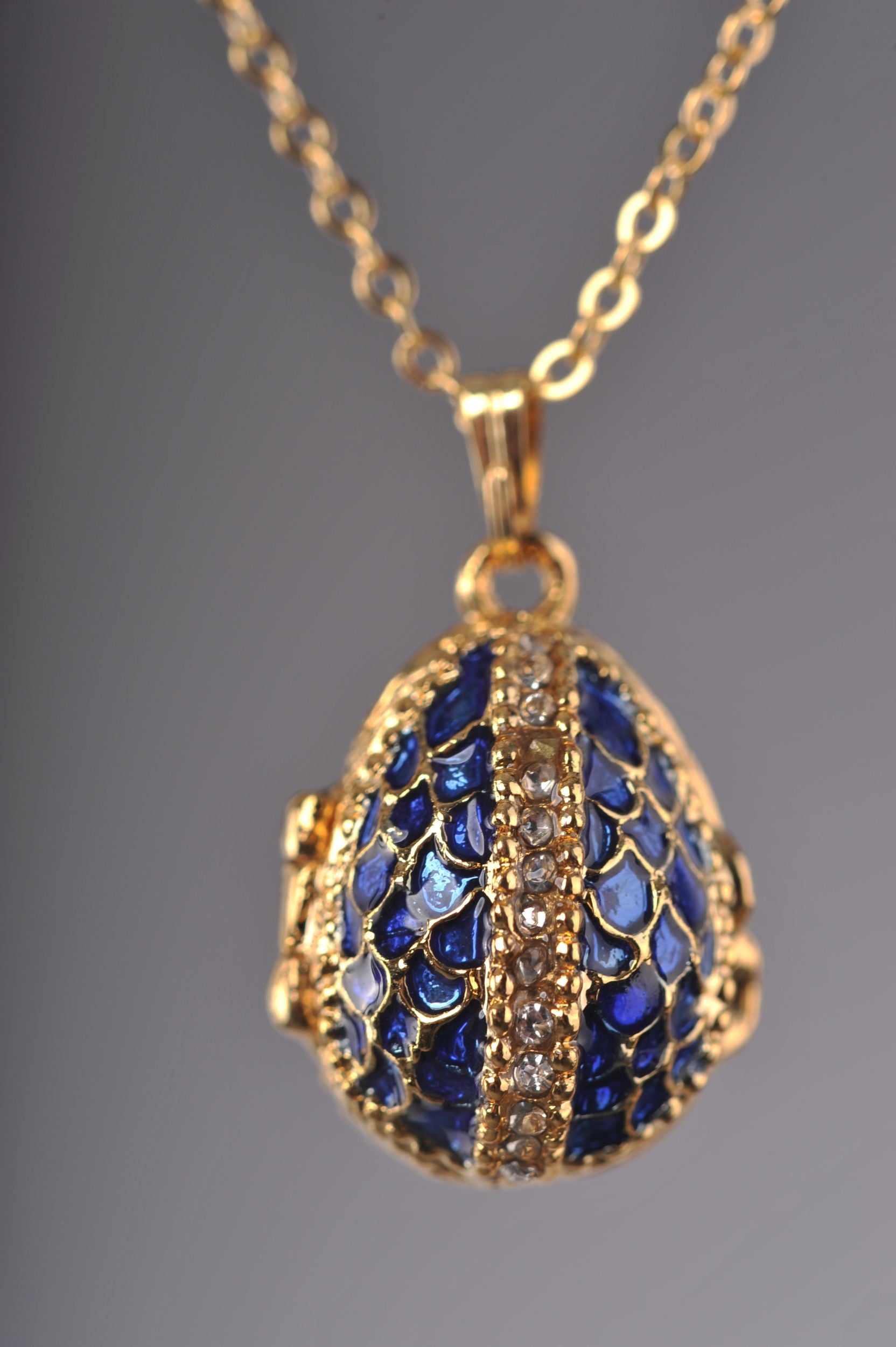 Keren Kopal Blue Egg Pendant with a Beetle