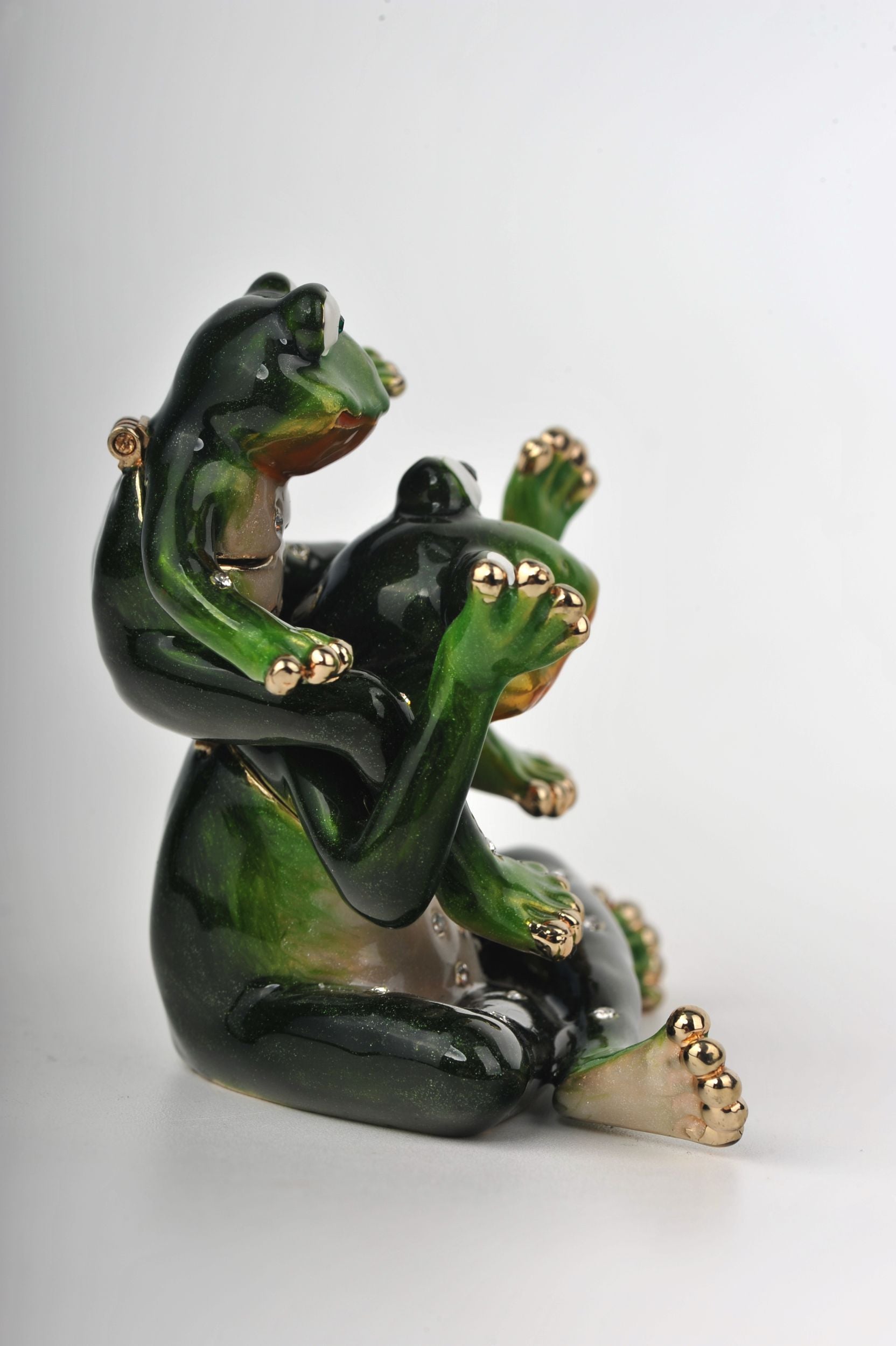 Keren Kopal Baby Frog sitting on a Frog