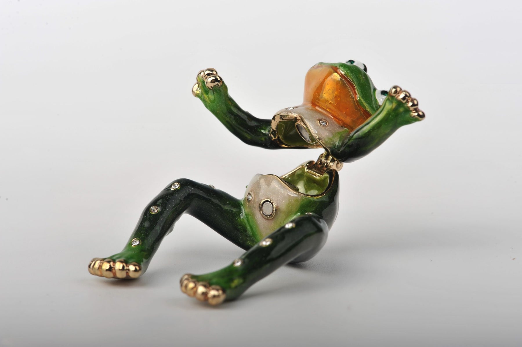 Keren Kopal Baby Frog sitting on a Frog