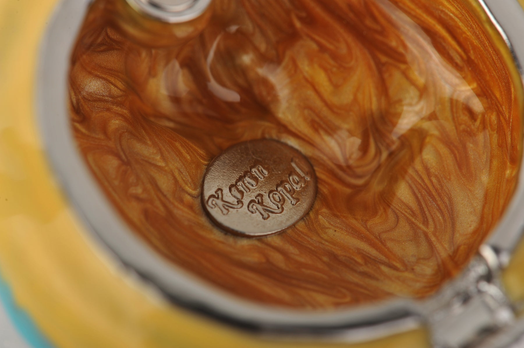 Keren Kopal Blue and Yellow Frosting Cupcake