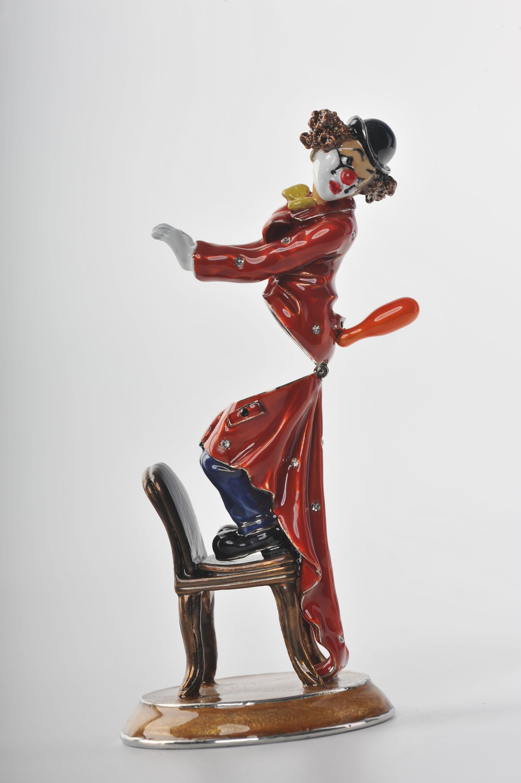 Keren Kopal Clown Standing on a Chair