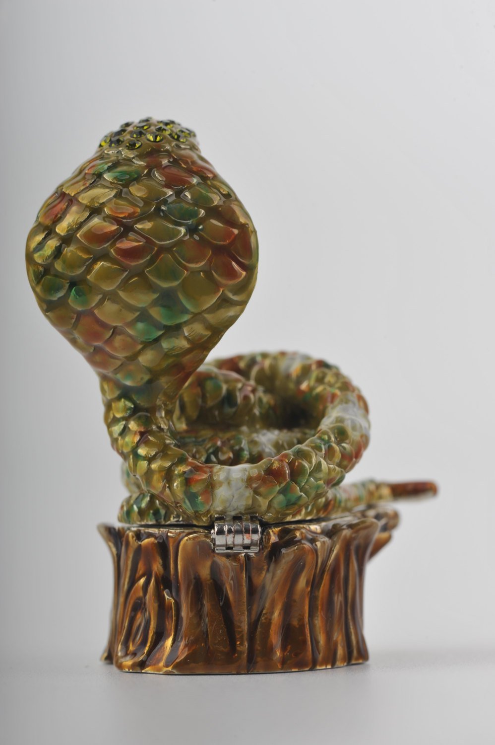 Keren Kopal Cobra Snake on Tree Trunk