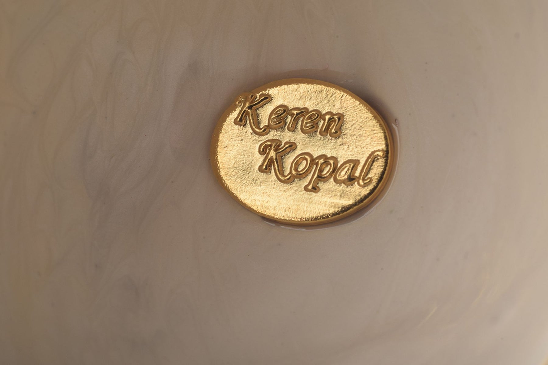 Keren Kopal Black and White Faberge Egg with Gold Necklace Inside