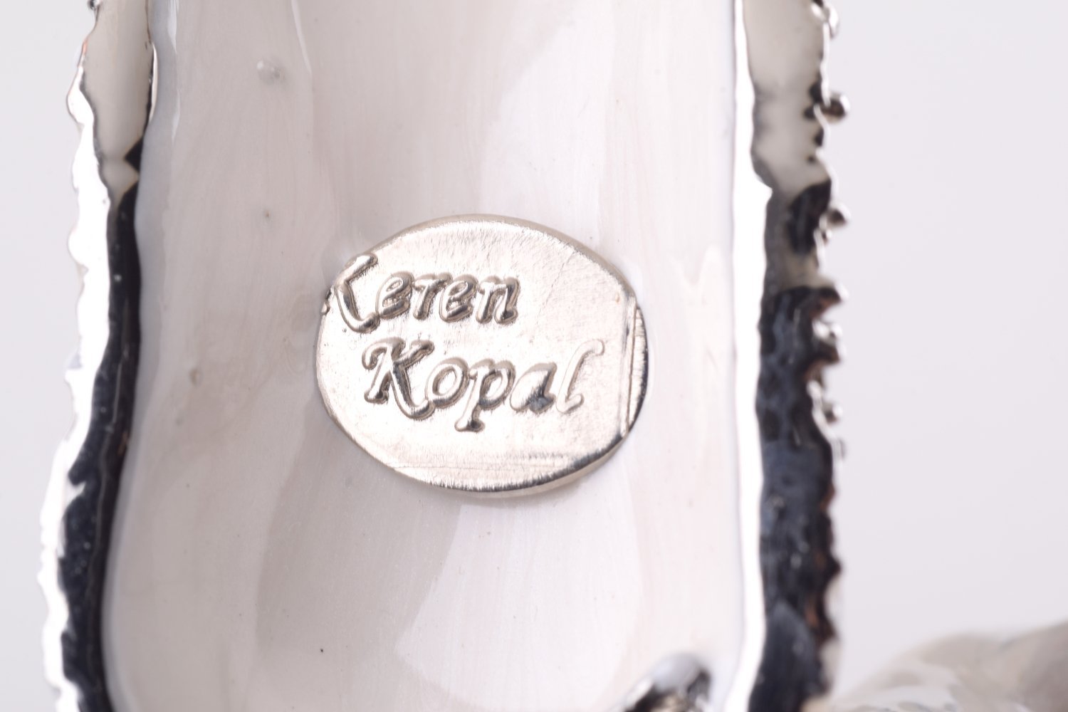 Keren Kopal Dog Playing with Can