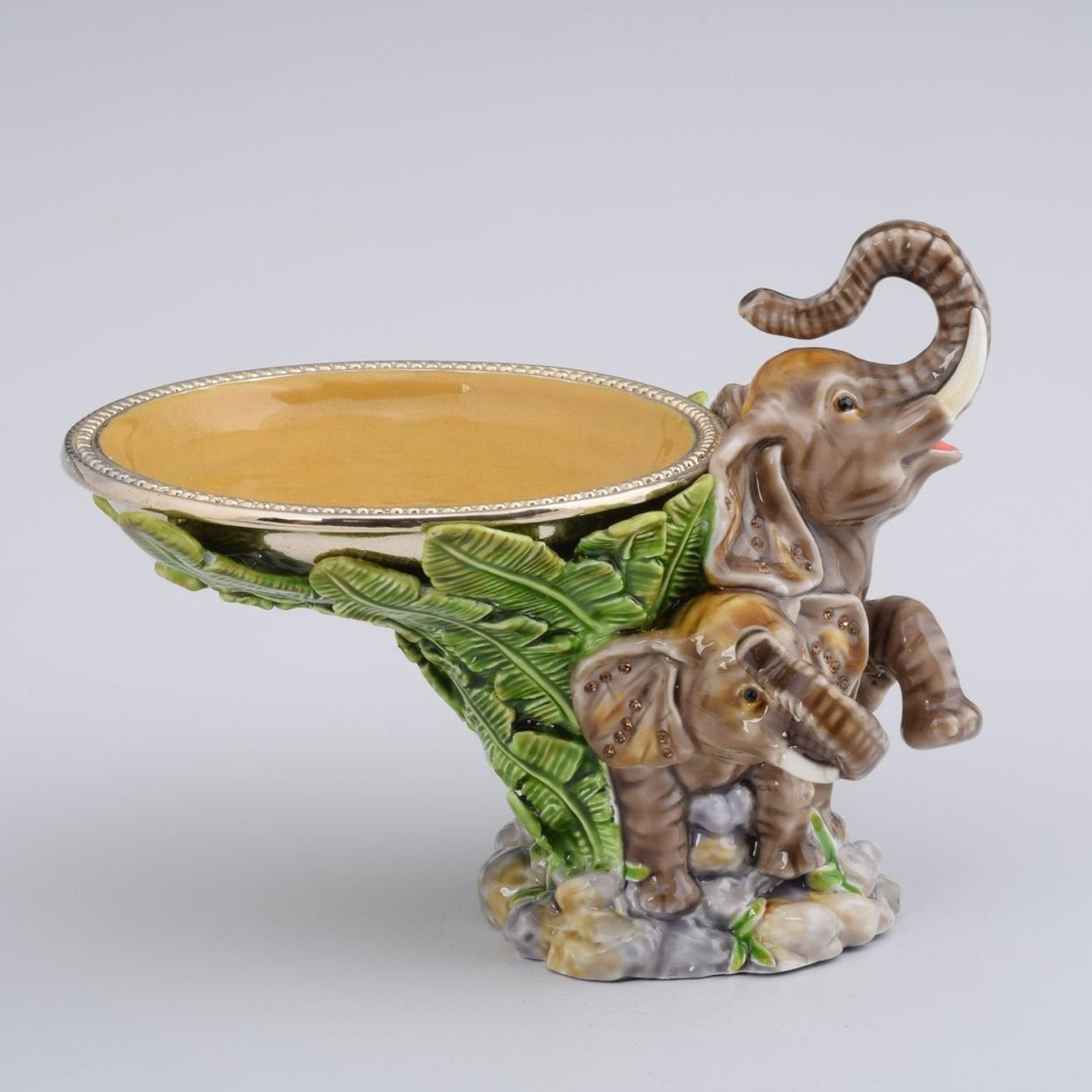 Keren Kopal Elephant Holding a Plate