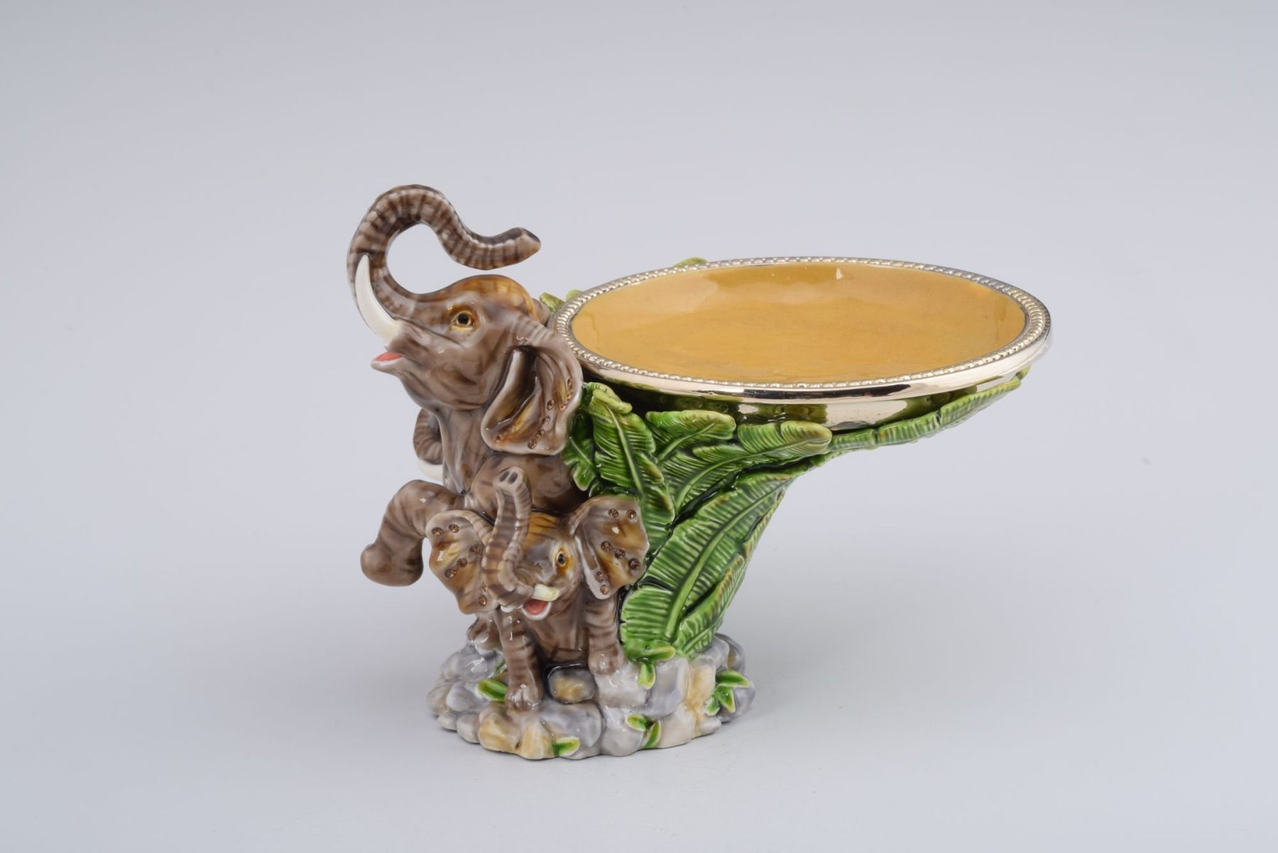 Keren Kopal Elephant Holding a Plate