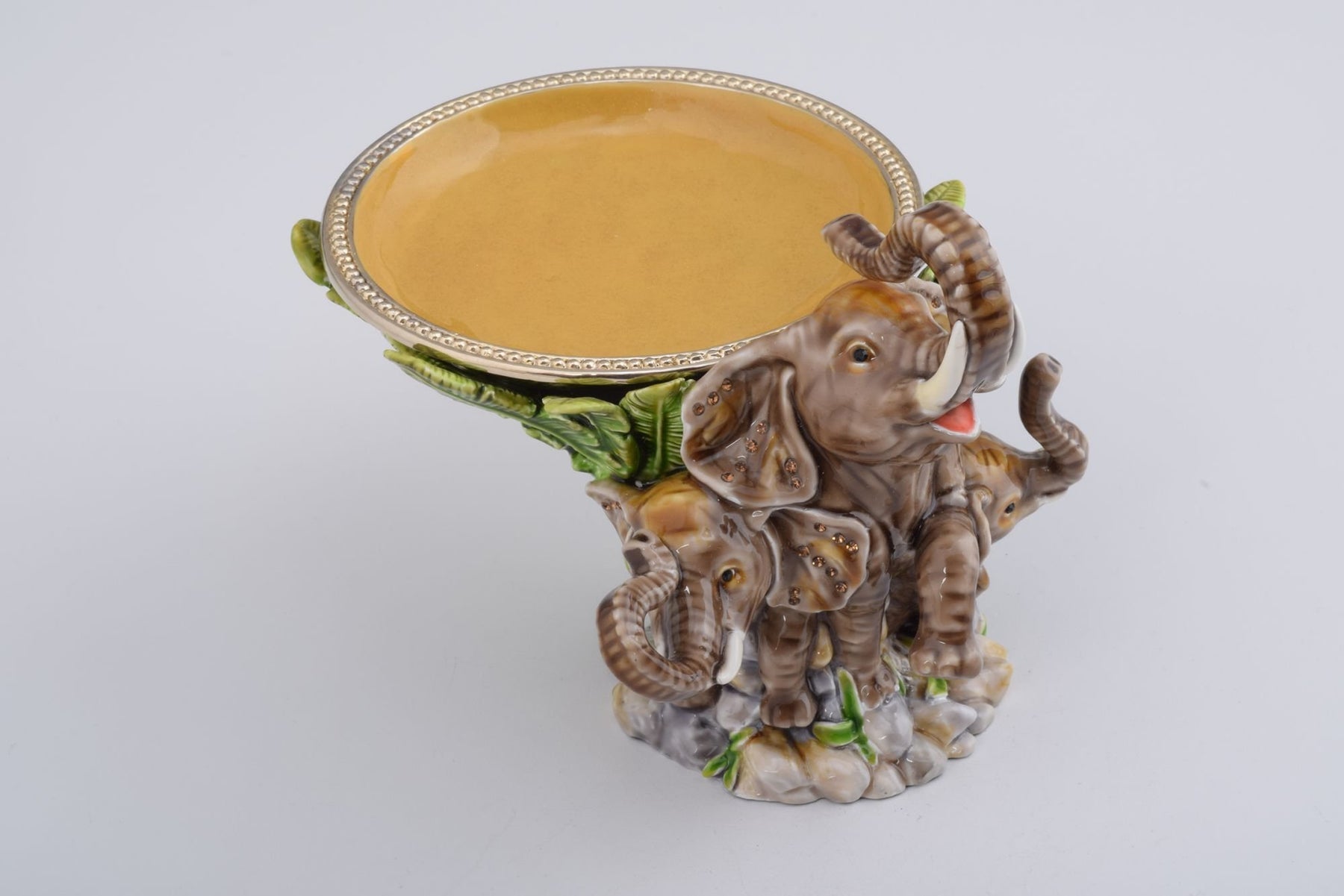 Keren Kopal Elephant Holding a Plate