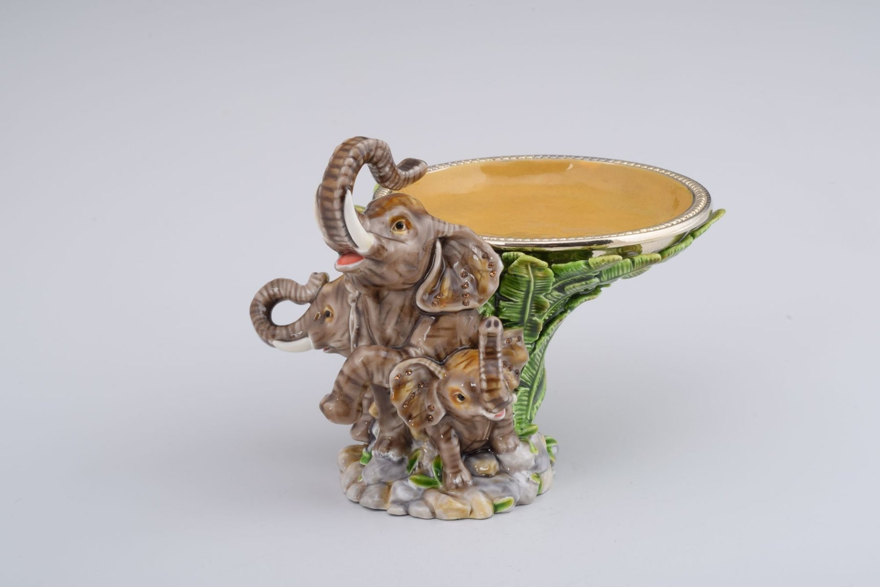 Keren Kopal Elephant Holding a Plate