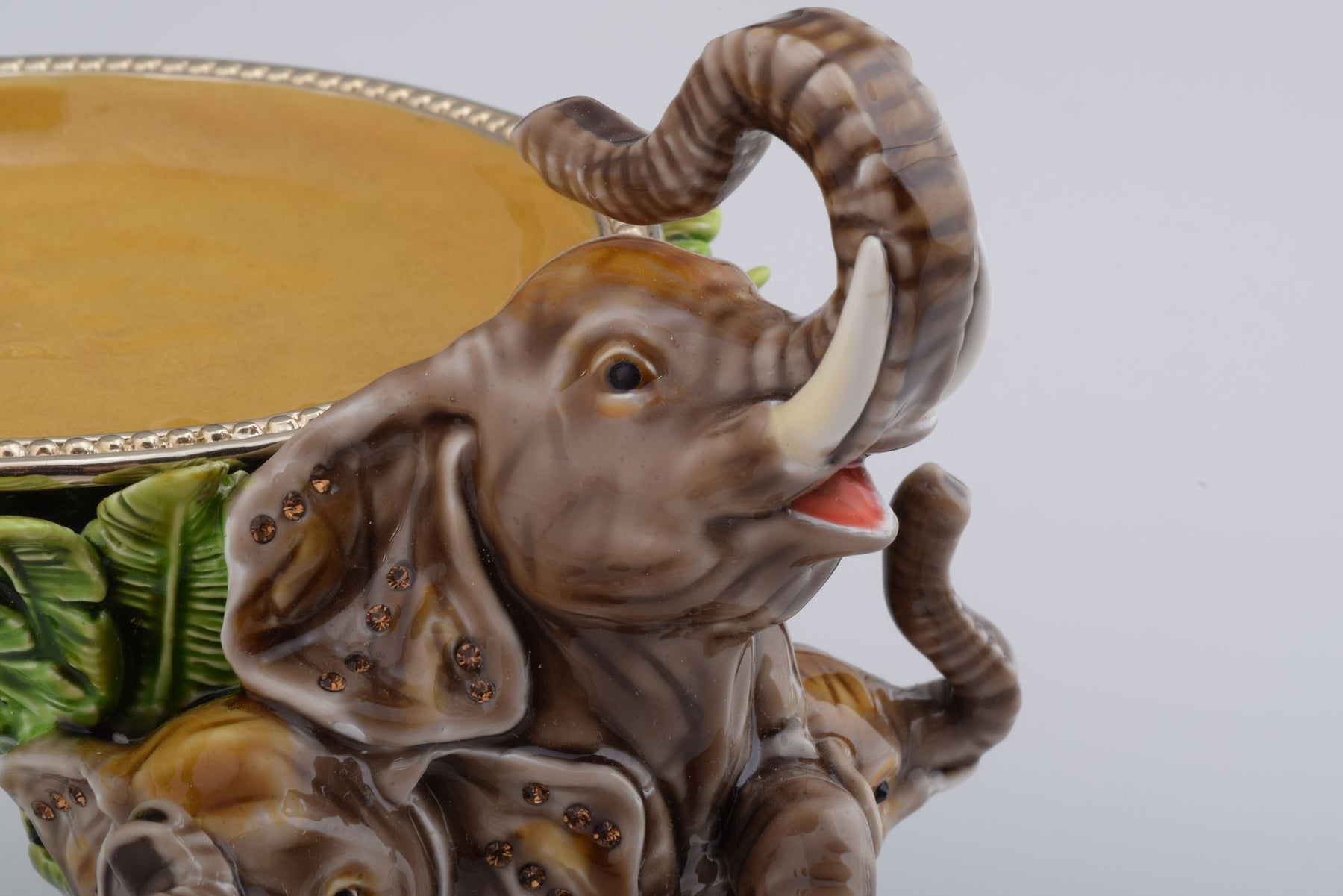 Keren Kopal Elephant Holding a Plate