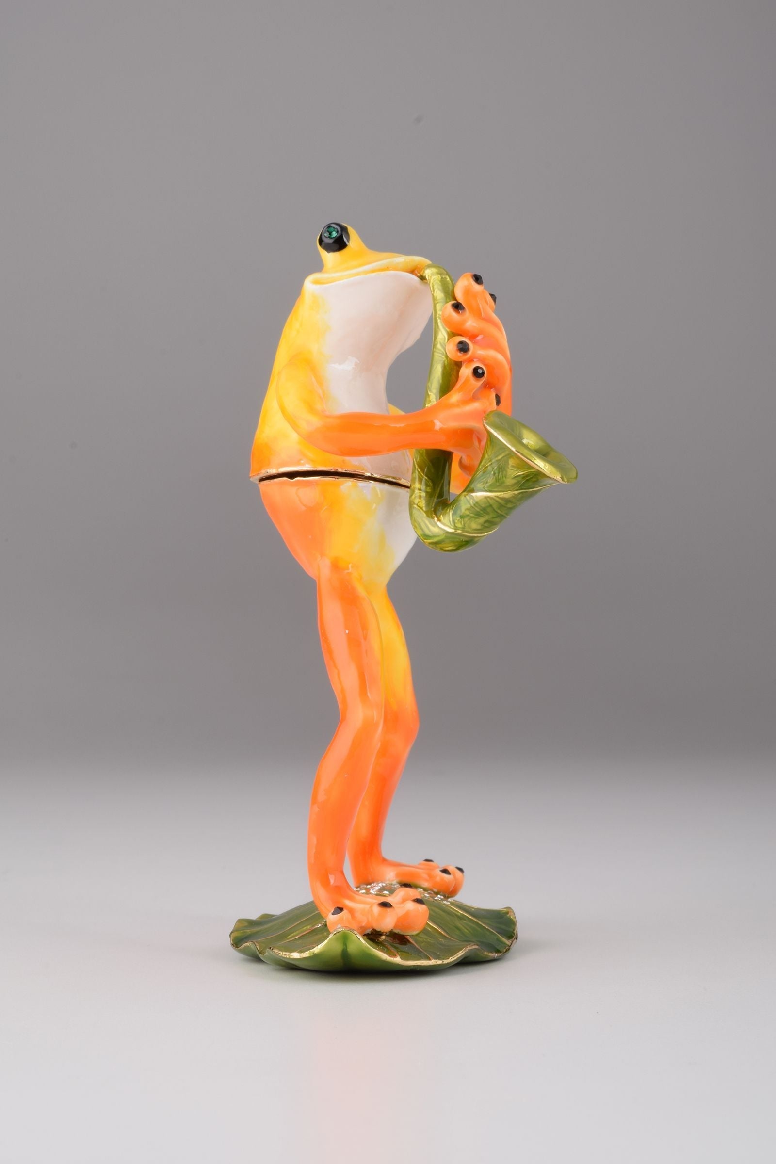 Keren Kopal Frog Playing a Saxophone
