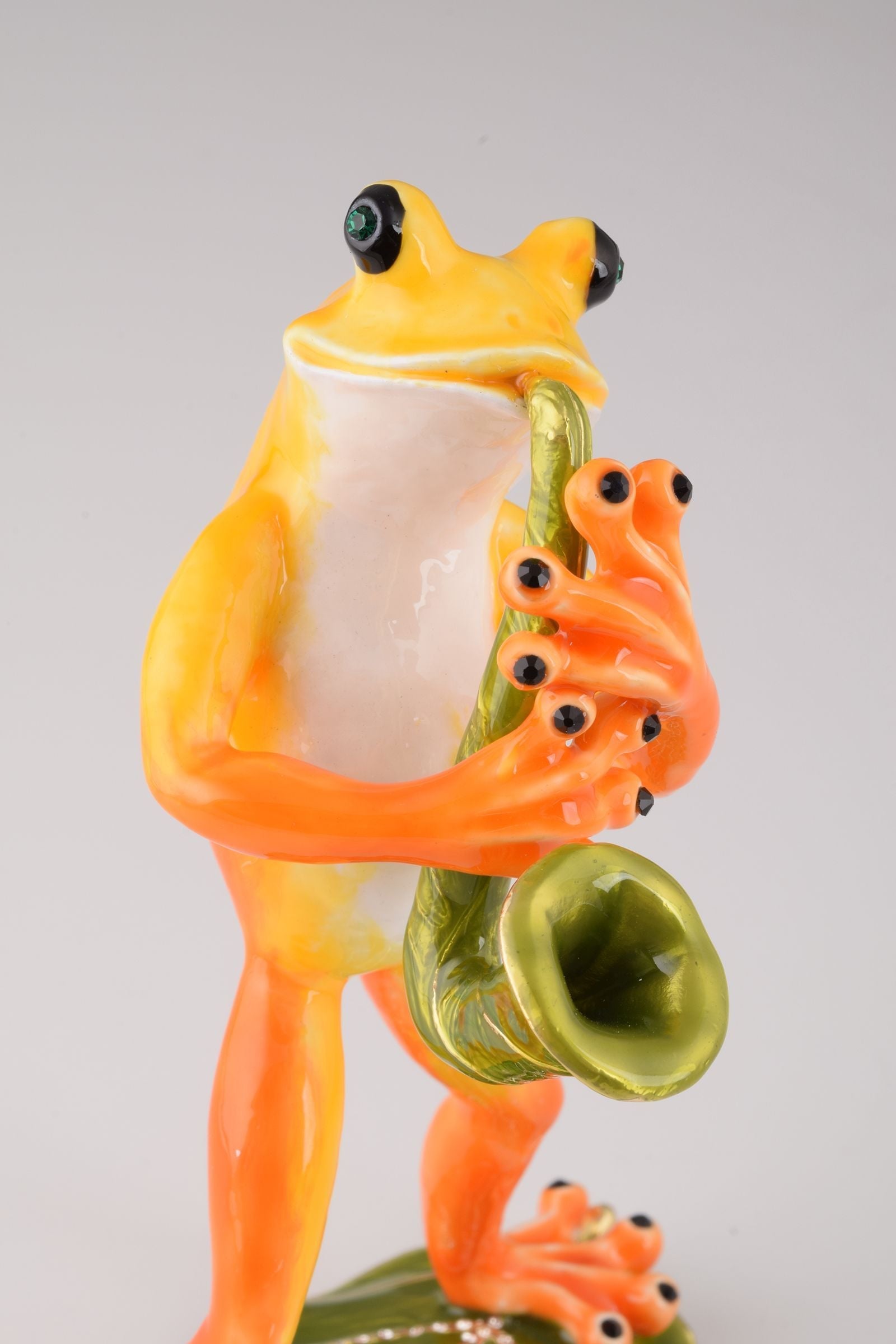 Keren Kopal Frog Playing a Saxophone