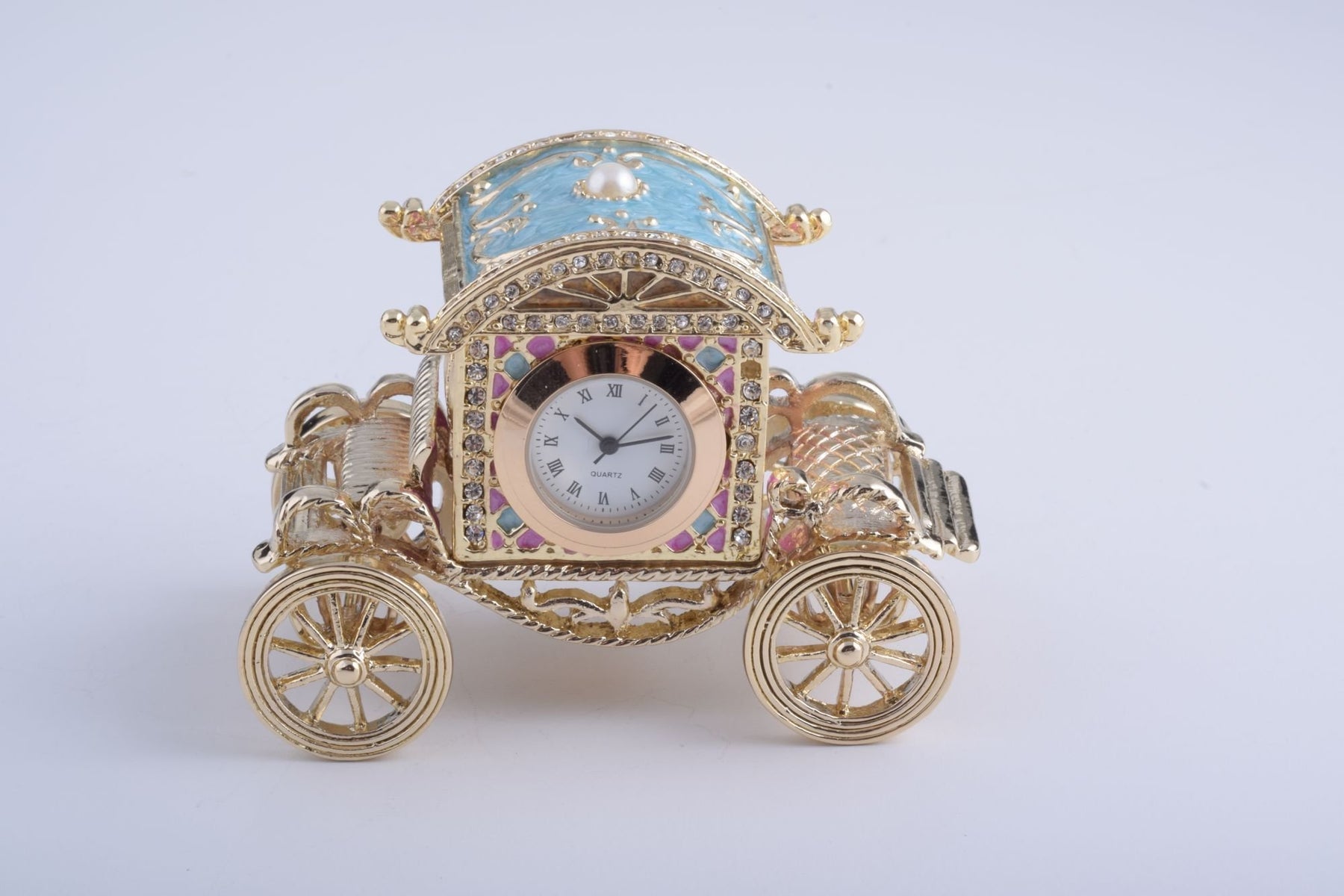 Keren Kopal Gold Carriage with a Clock