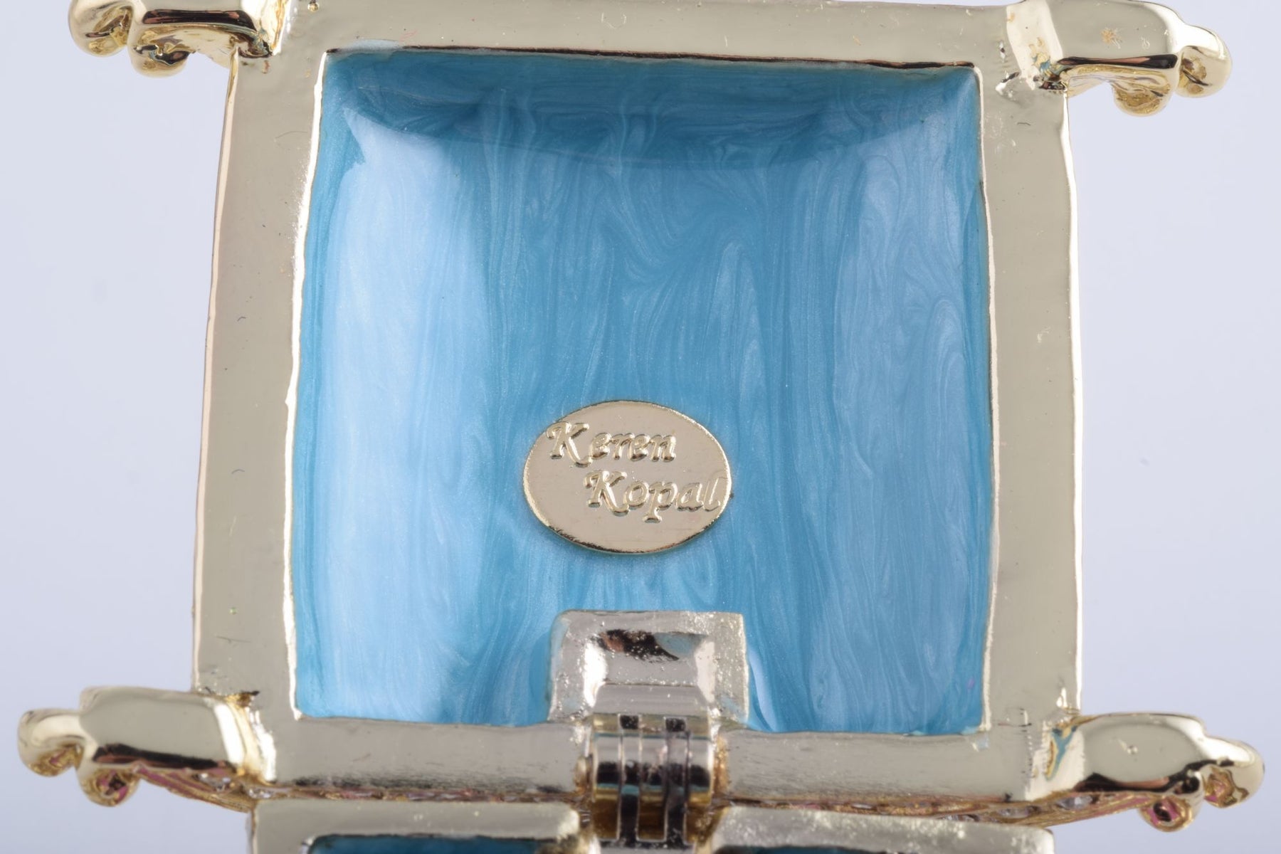 Keren Kopal Gold Carriage with a Clock