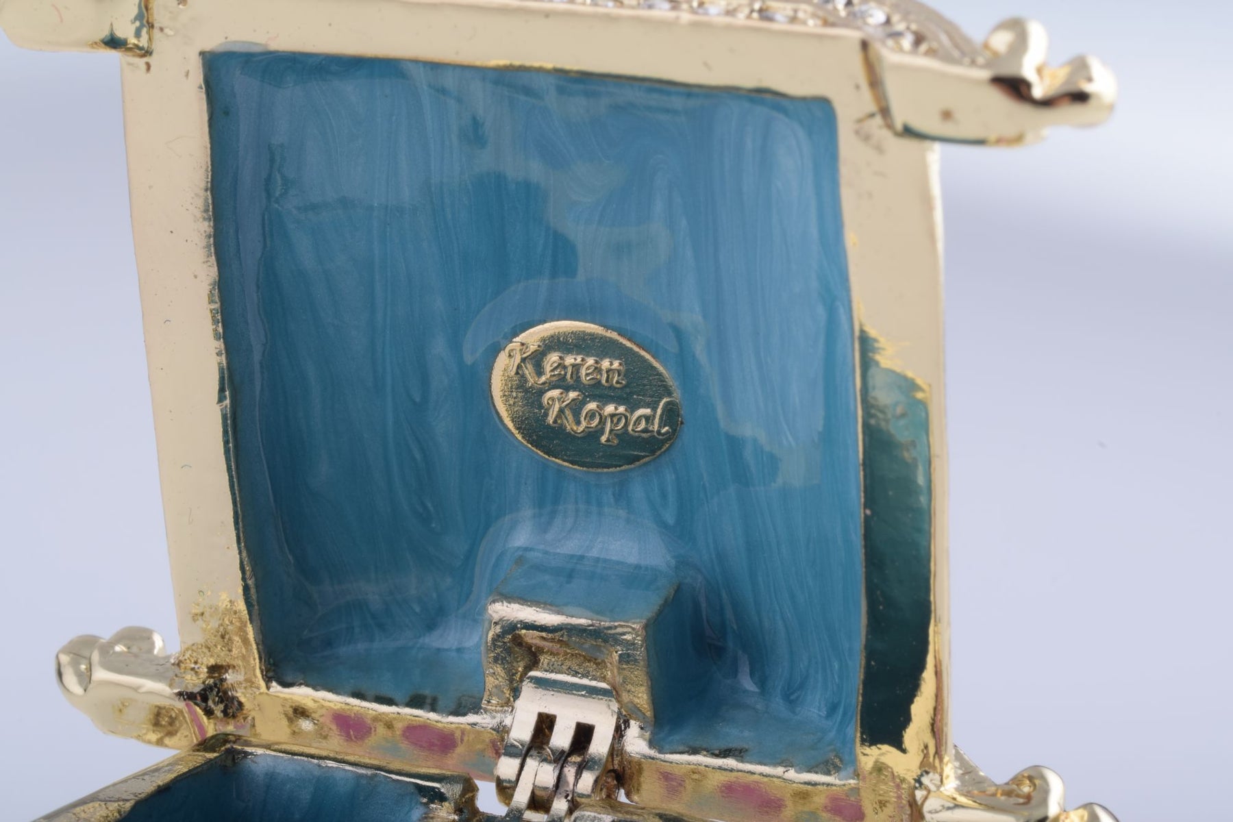 Keren Kopal Gold Carriage with a Clock