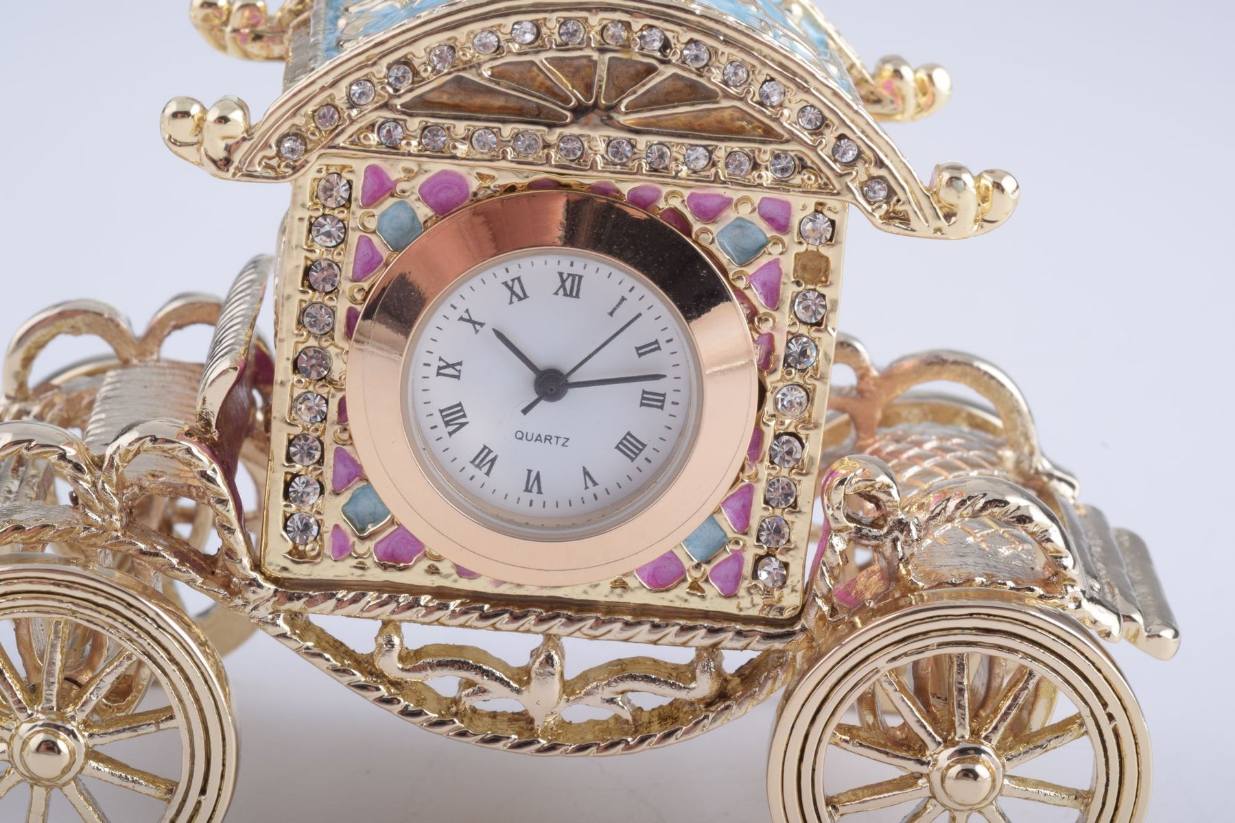 Keren Kopal Gold Carriage with a Clock