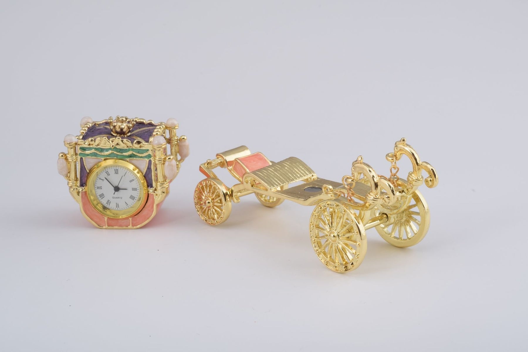 Keren Kopal Golden Carriage with a Clock