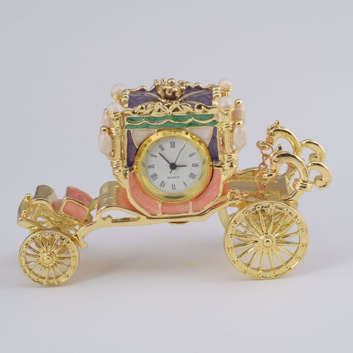 Keren Kopal Golden Carriage with a Clock