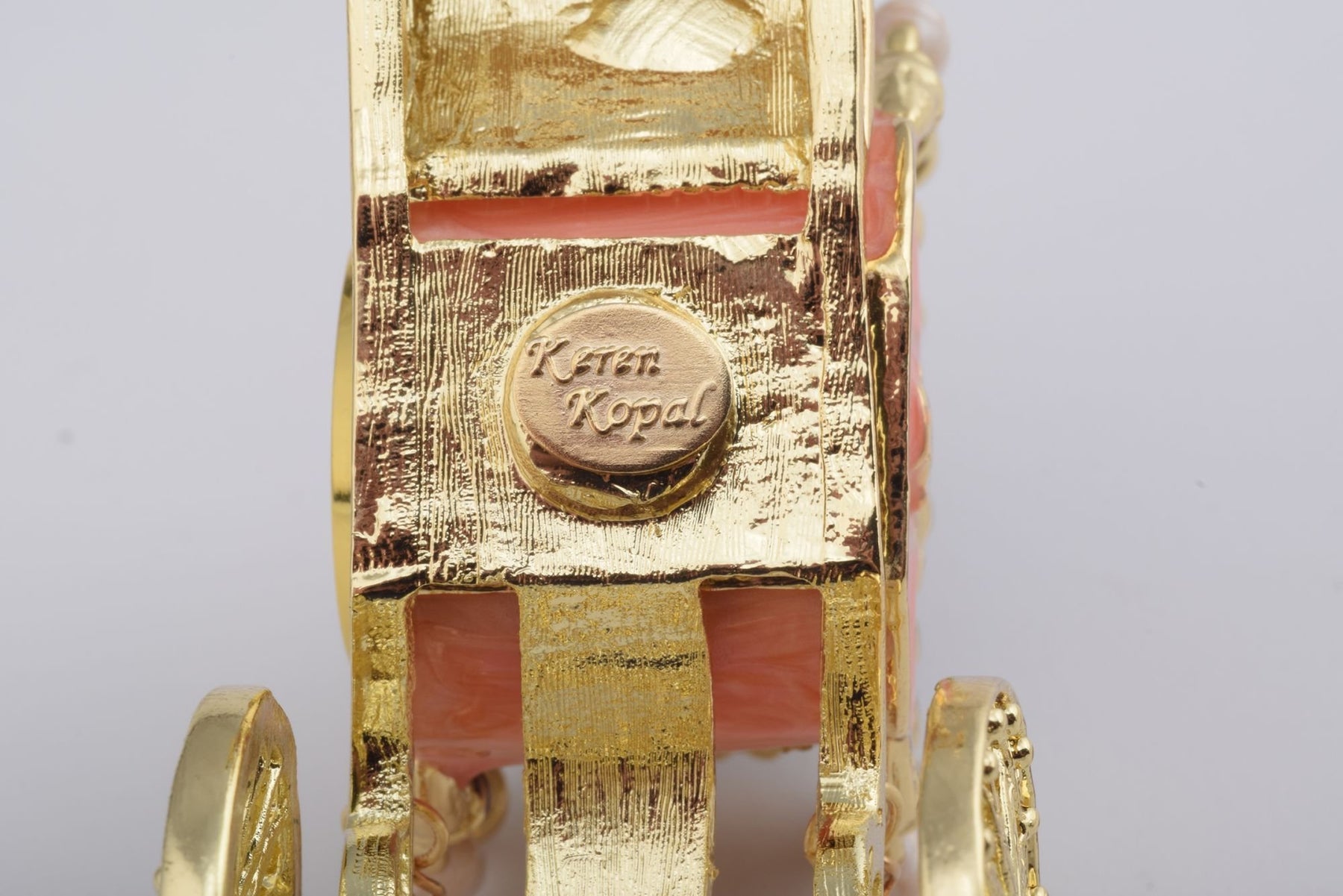 Keren Kopal Golden Carriage with a Clock