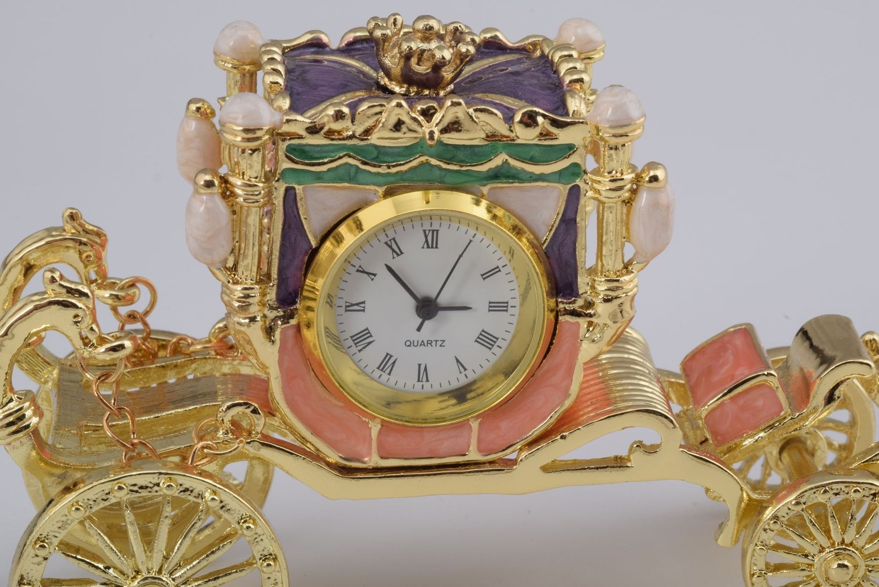Keren Kopal Golden Carriage with a Clock