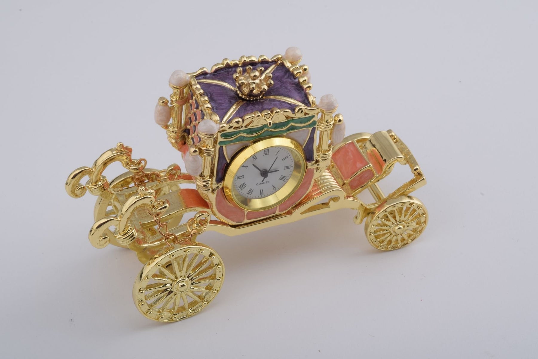 Keren Kopal Golden Carriage with a Clock