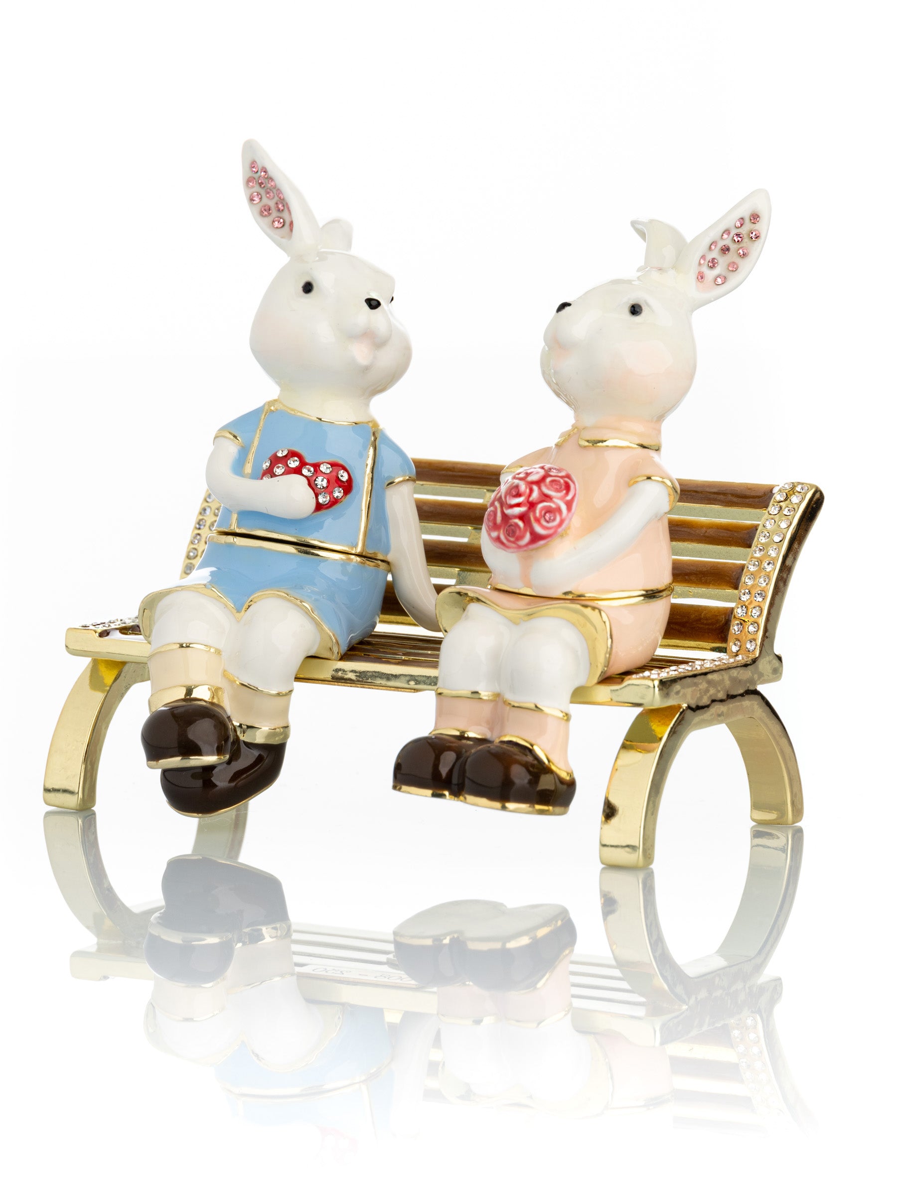 Keren Kopal 2 bunnies in love sitting on a bench, valentine flowers and chocolates
