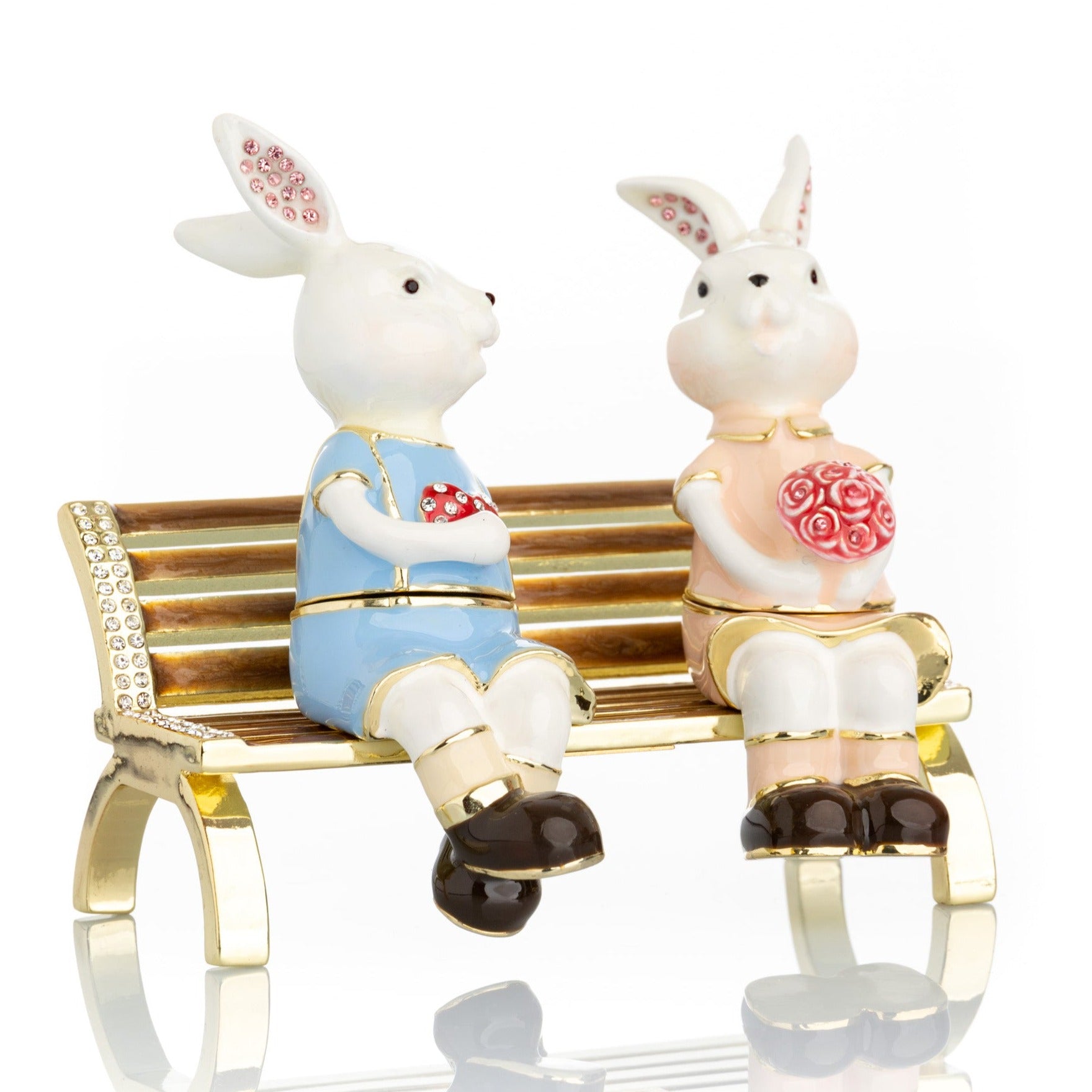 Keren Kopal 2 bunnies in love sitting on a bench, valentine flowers and chocolates