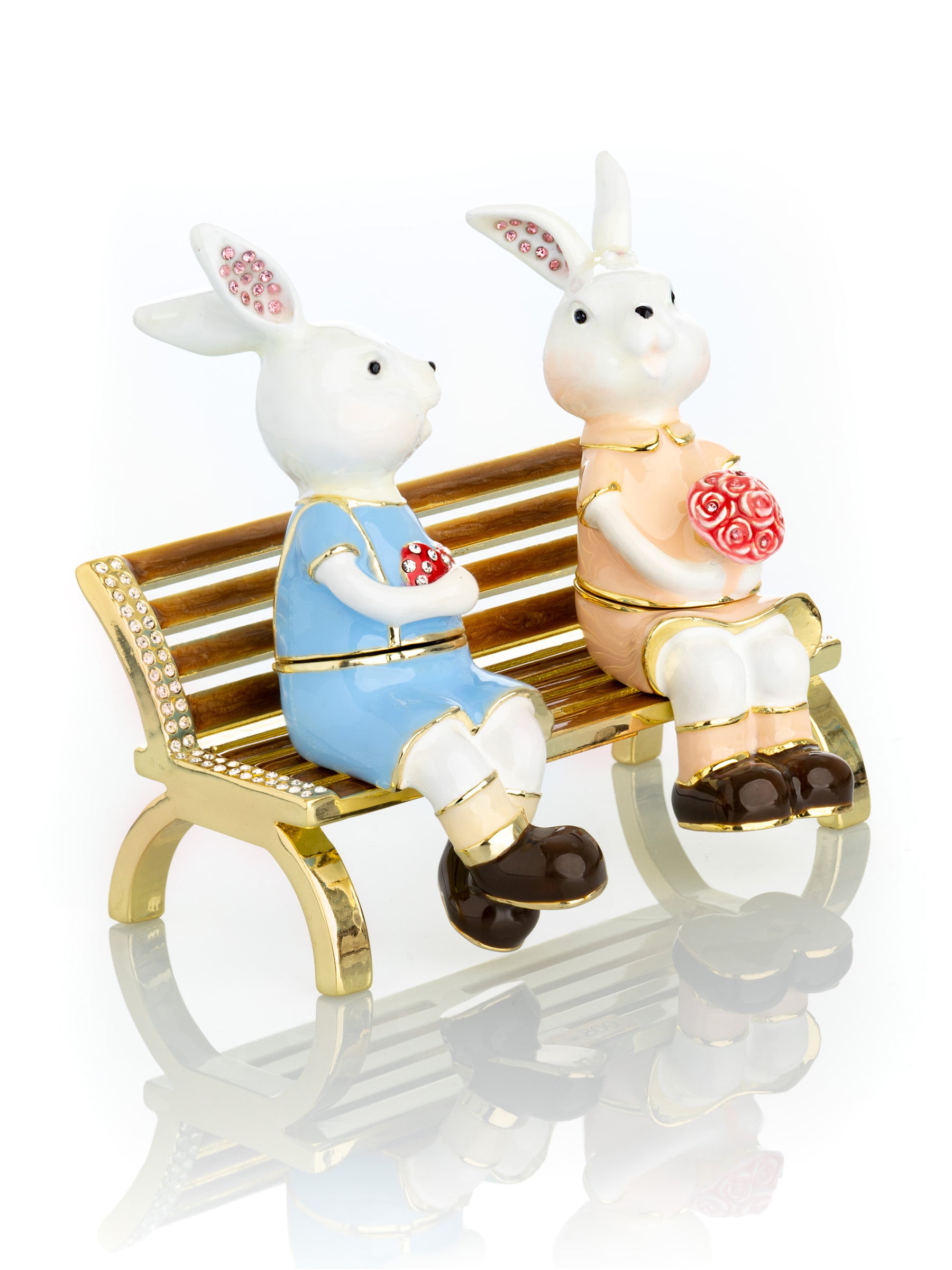 Keren Kopal 2 bunnies in love sitting on a bench, valentine flowers and chocolates