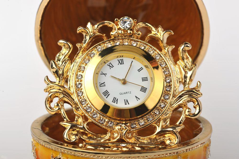 Keren Kopal Orange and Yellow Faberge Egg with a Gold Clock