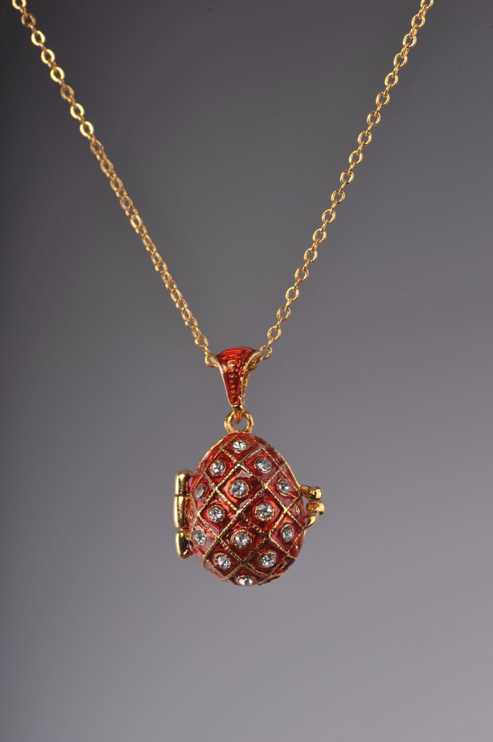 Keren Kopal Red Egg Pendant with a Surprise Apple Inside