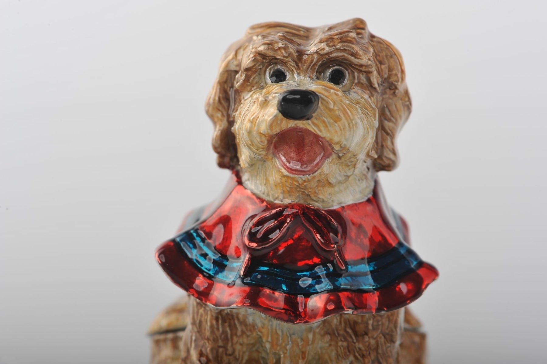 Keren Kopal Sitting Dog