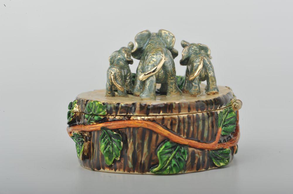 Keren Kopal Three Elephants on Tree Trunk