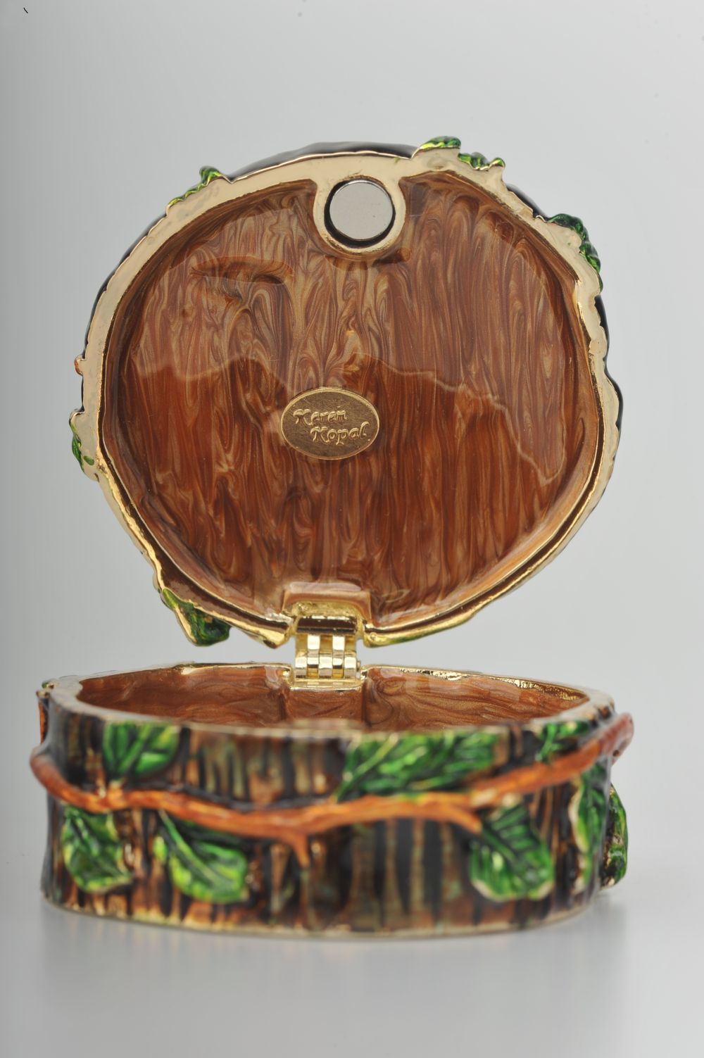 Keren Kopal Three Elephants on Tree Trunk