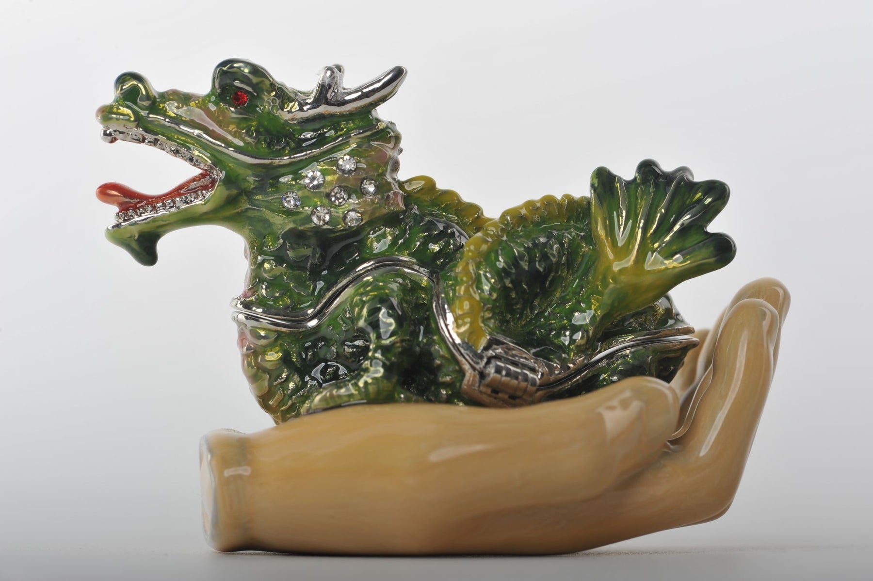 Keren Kopal Zodiac Dragon Laying on Hand